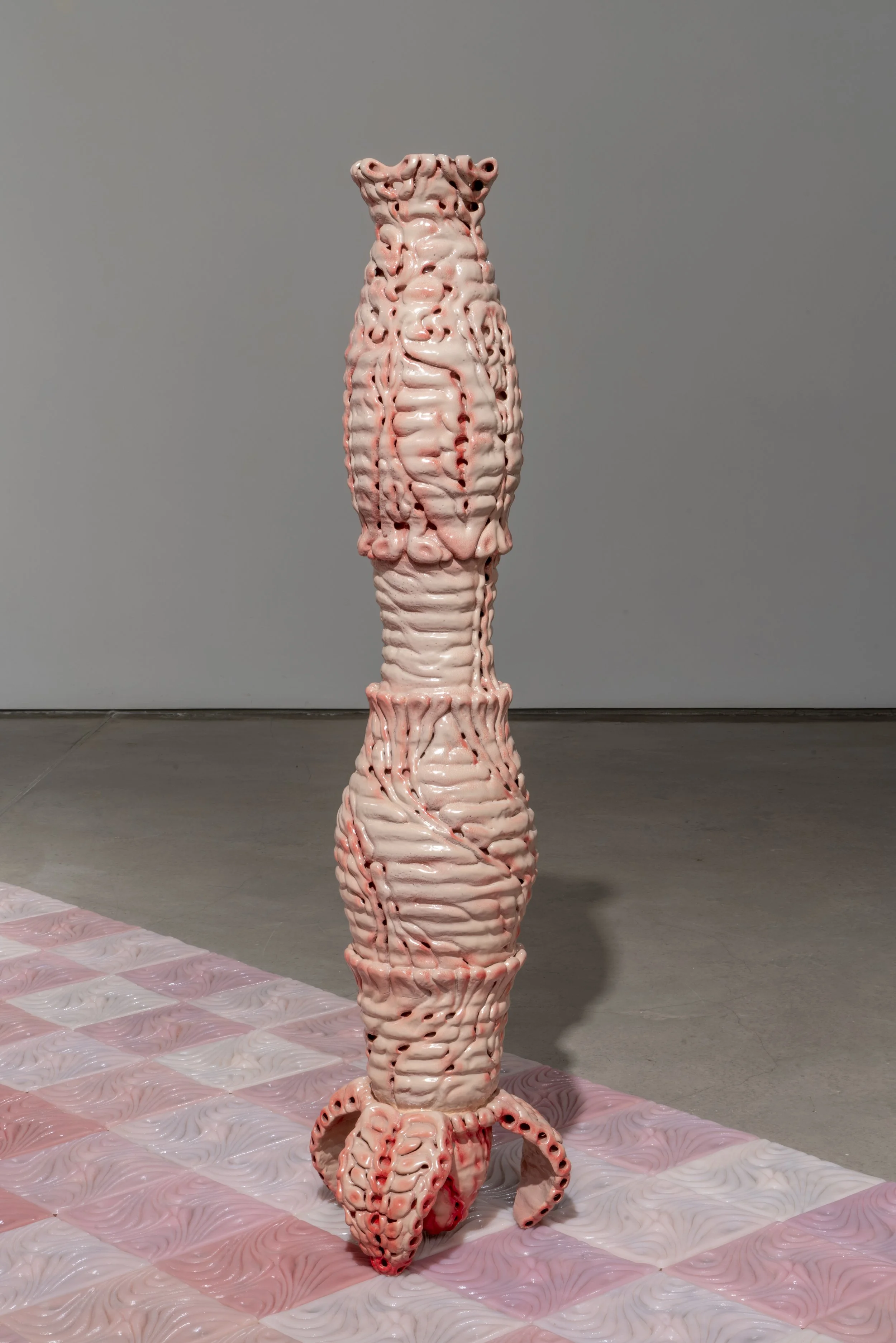 Nomadic gut, 2025. Ceramic, fake diamonds. 61 x 15 x 15 in.