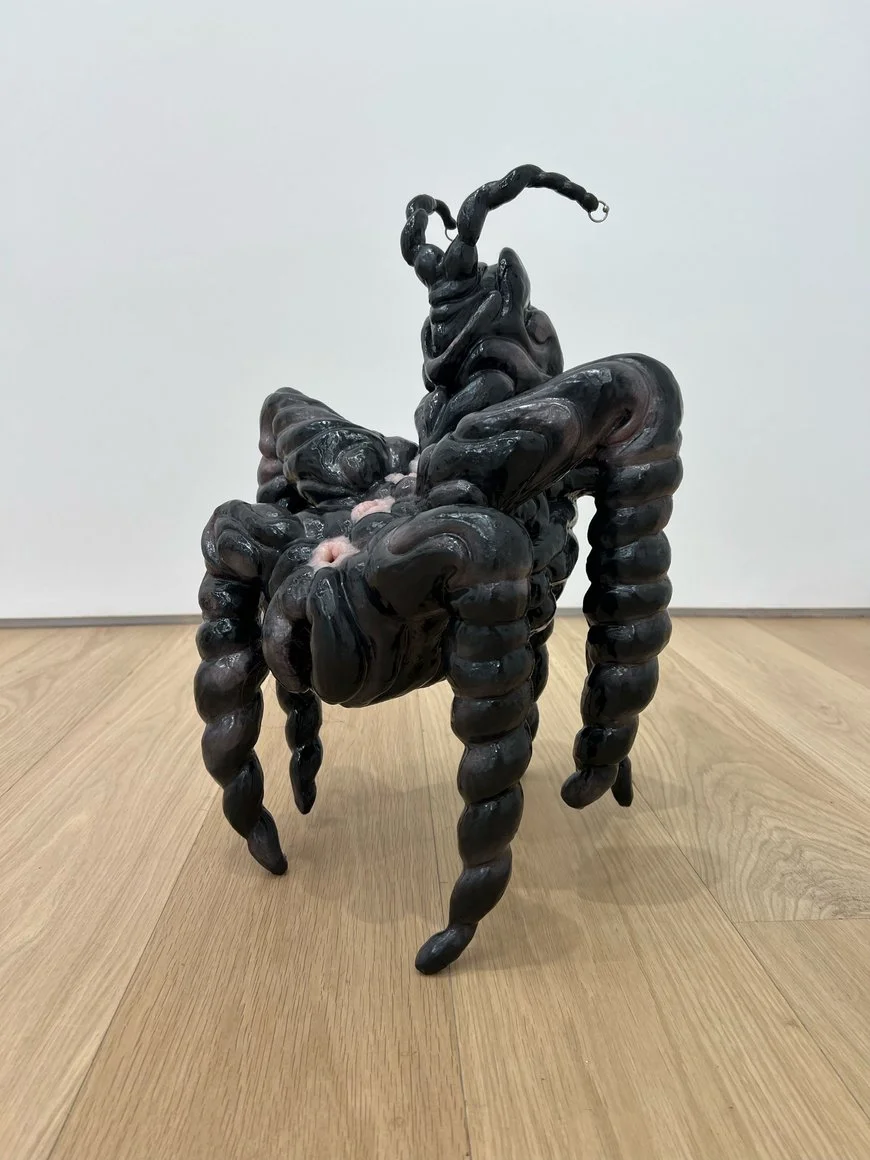 Gatekeeper, 2025. Stoneware, glaze, beeswax, piercings, silicone, synthetic hair. 18h x 14w x 8.50d in.  
Photo: Etienne Frossard.