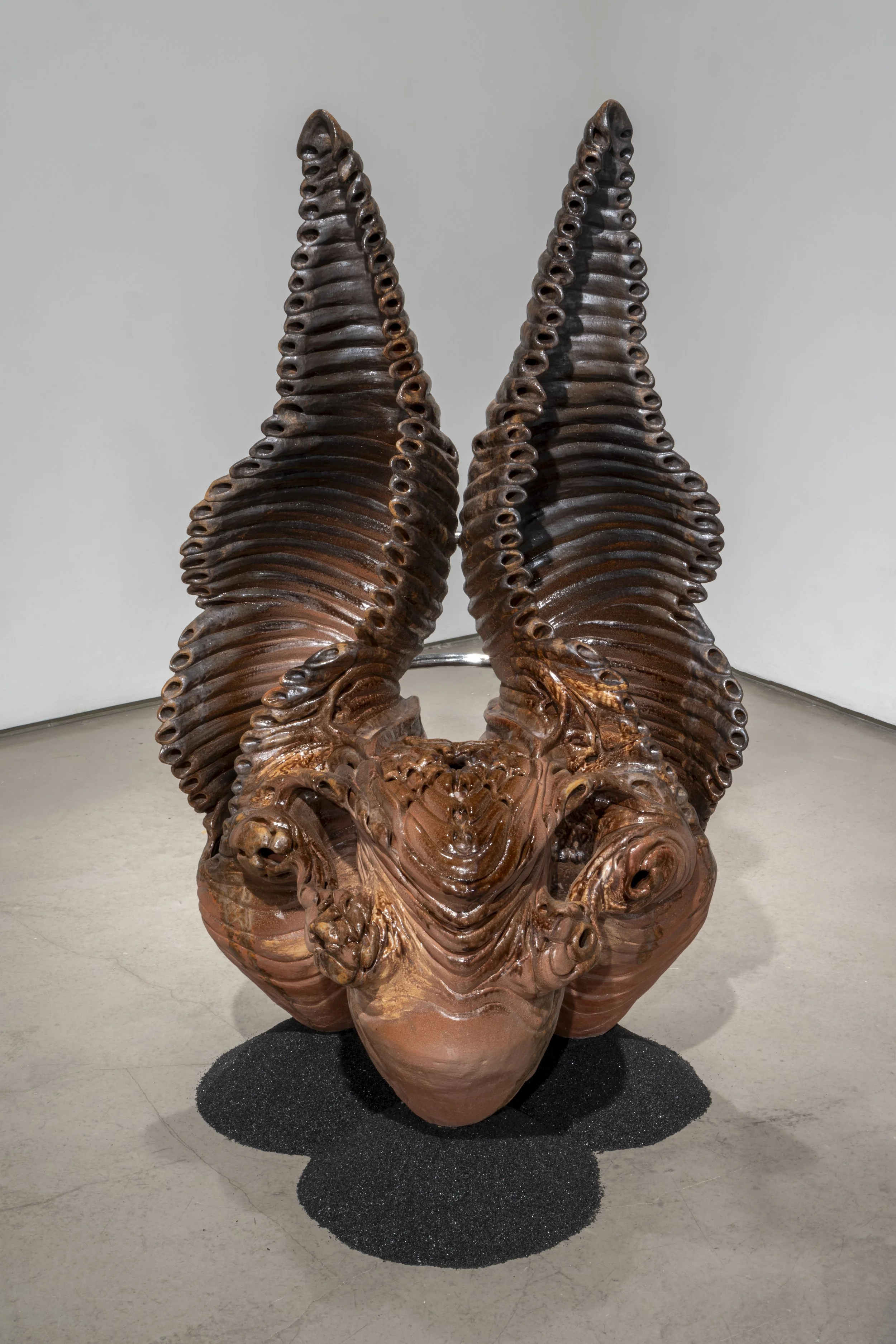 Twisted wings, 2025. Ceramic, steel and sand blasting medium. 54 x 32 x 32 in.
