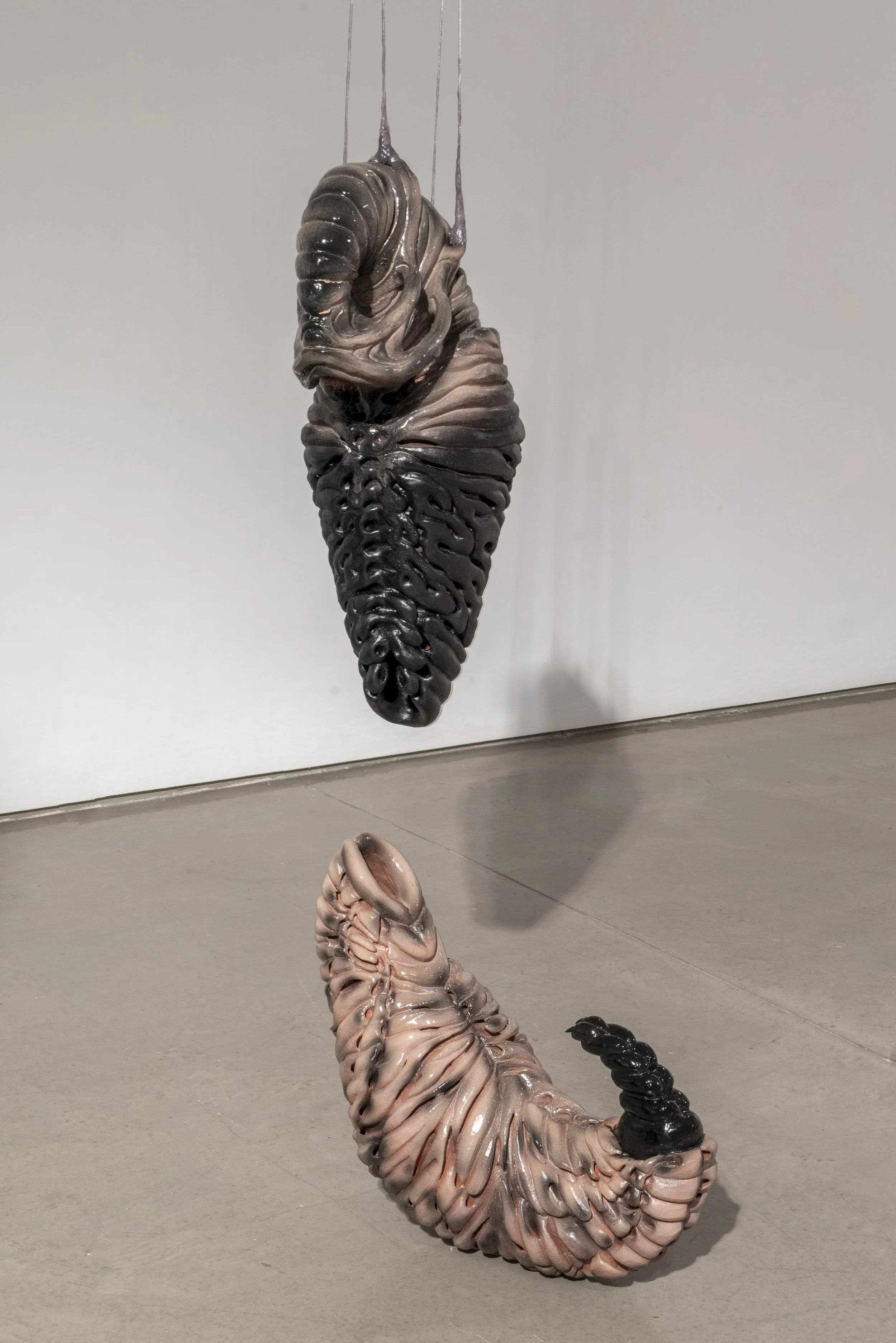Untitled, 2025. Ceramic, rubber, silicone, human hair, beeswax, acrylic nails. Various dimensions.