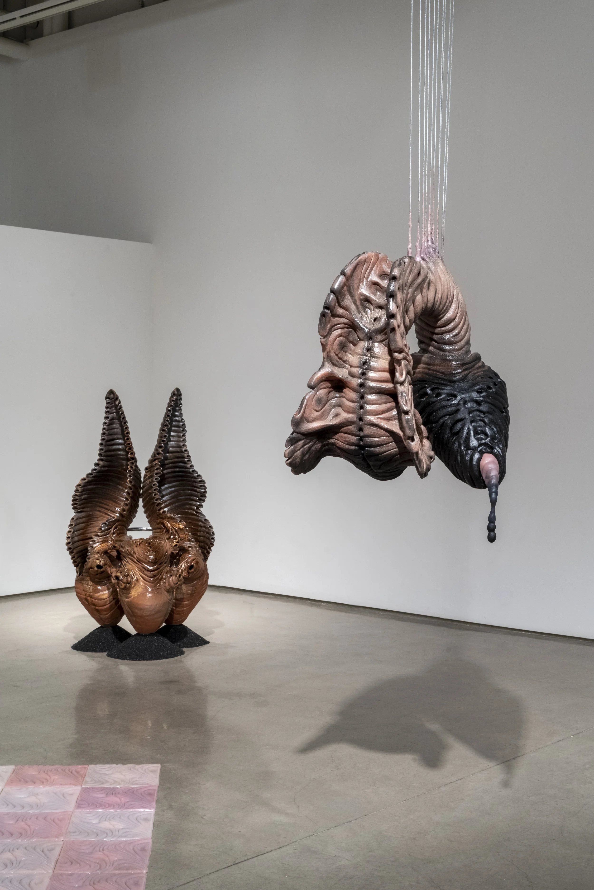 Installation view of: ant/i/bodies, 2025.
Ceramic, silicone, human hair, steel, sand blasting medium. Various dimensions.