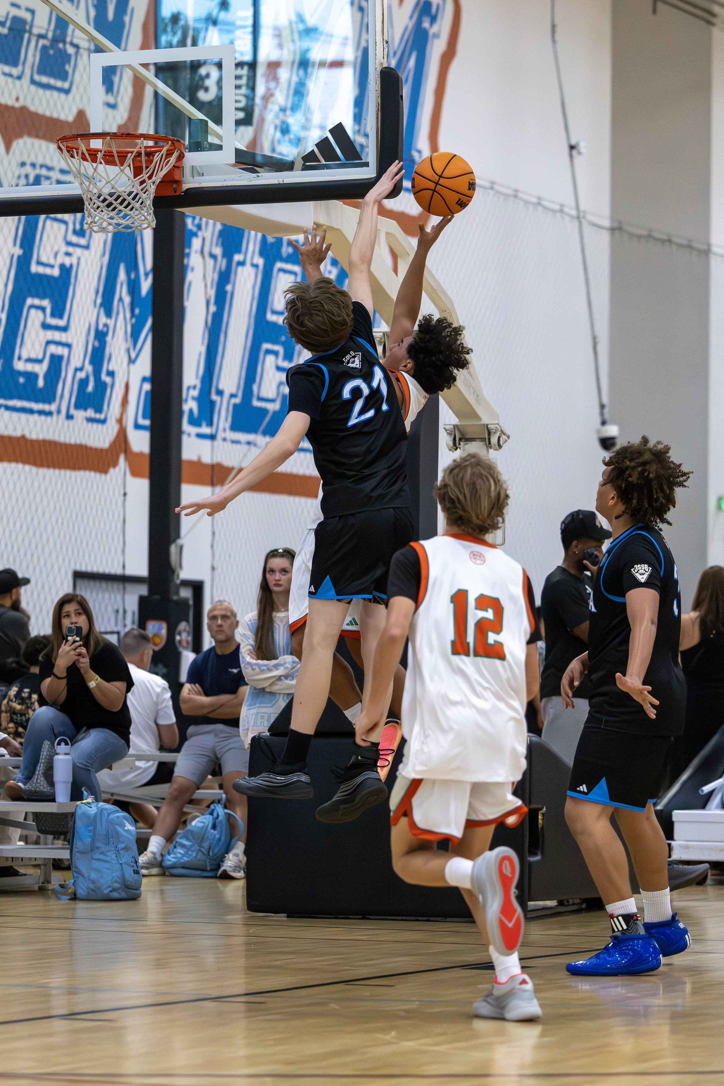 Nova Hoops high school basketball player finishing at the basket