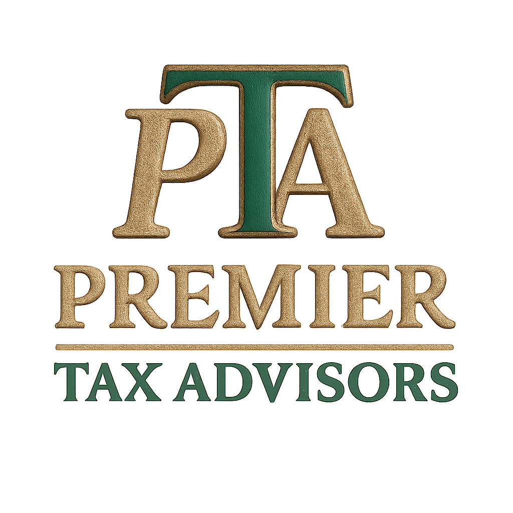 A woman in a black blazer and beige shirt sitting at a desk, signing tax documents with a pen. There is a calculator, an open notebook, and a laptop on the desk. A framed picture and a plant are in the background.