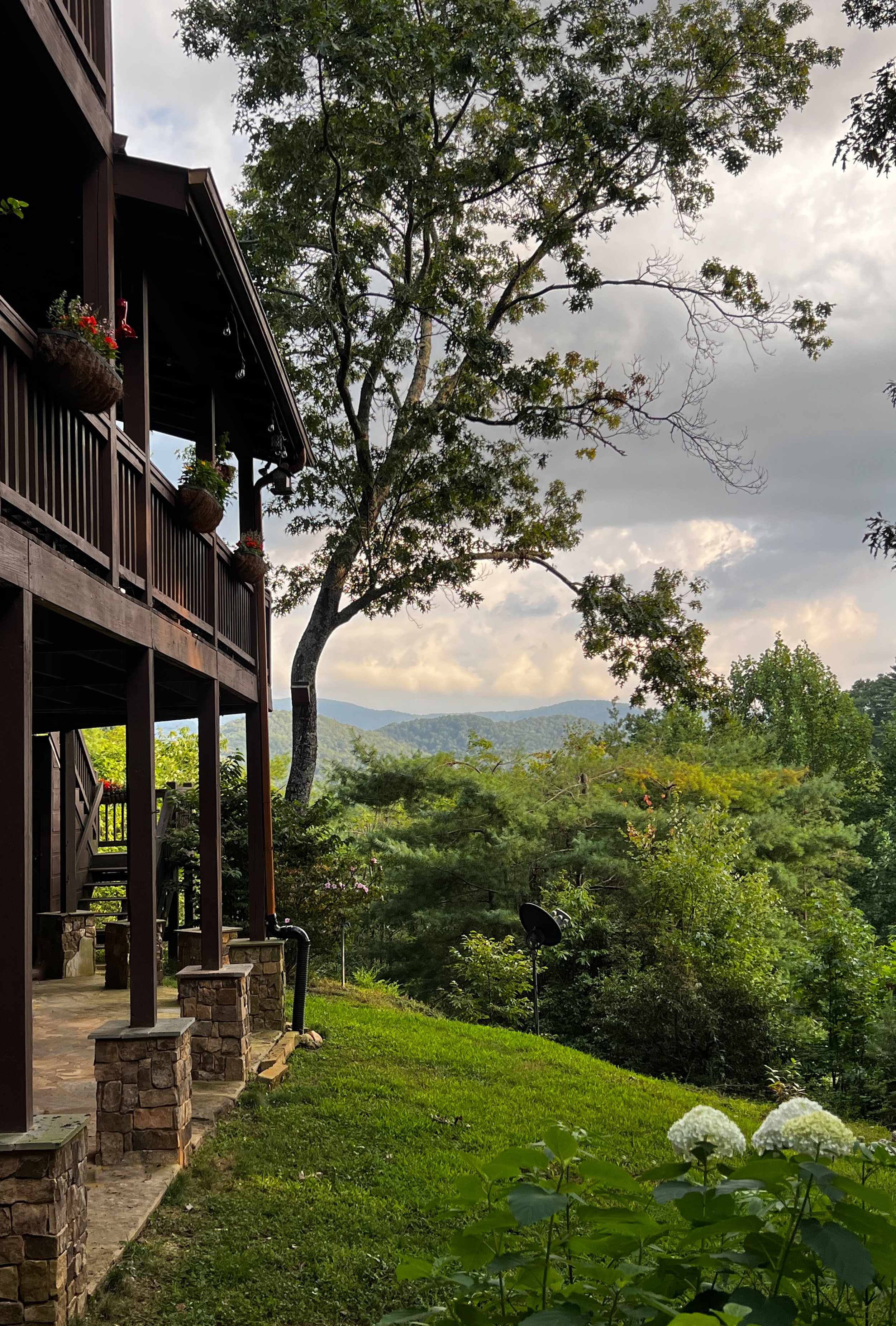 Yard with Updated lower level patio with stone column bases and flagstone(1).JPG