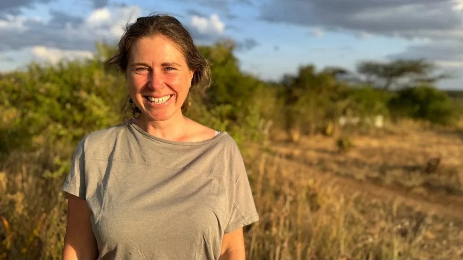 Lark (USA)
Samburu County, Kenya.  

Lark shines brightly from the inside out. With a background in sustainable development and Spanish linguistics, she has a natural ability to connect across cultures and lifestyles. Her journey led her to Auroville
