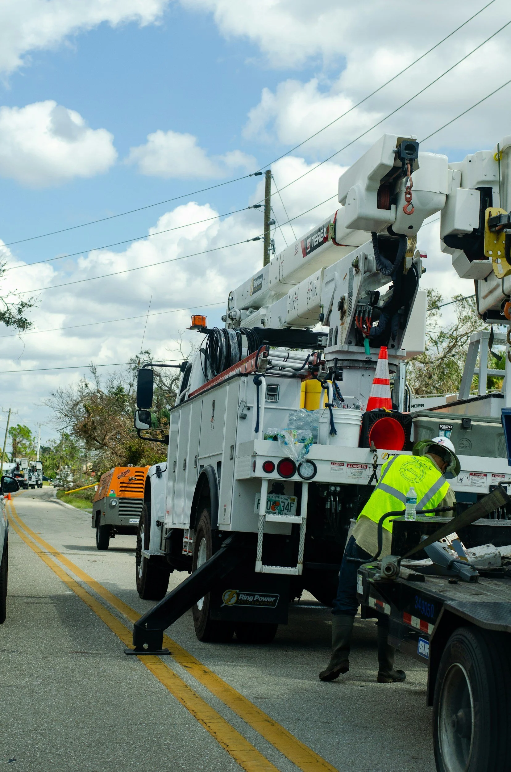 professional tree service team beginning clean up after a hurricane and performing emergency services