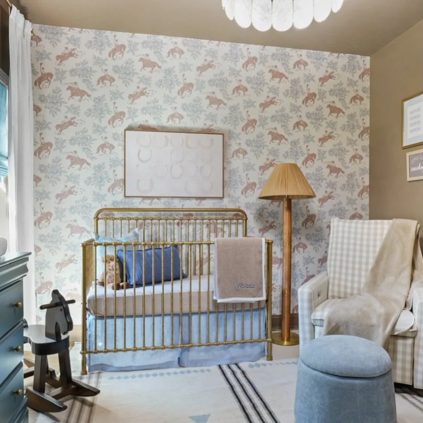 From guest bedroom to timeless nursery ✨

What was once a guest bedroom was thoughtfully reimagined into an upscale nursery designed to grow with this little one. By keeping the original chandelier, window treatments, and warm wall color, we preserve
