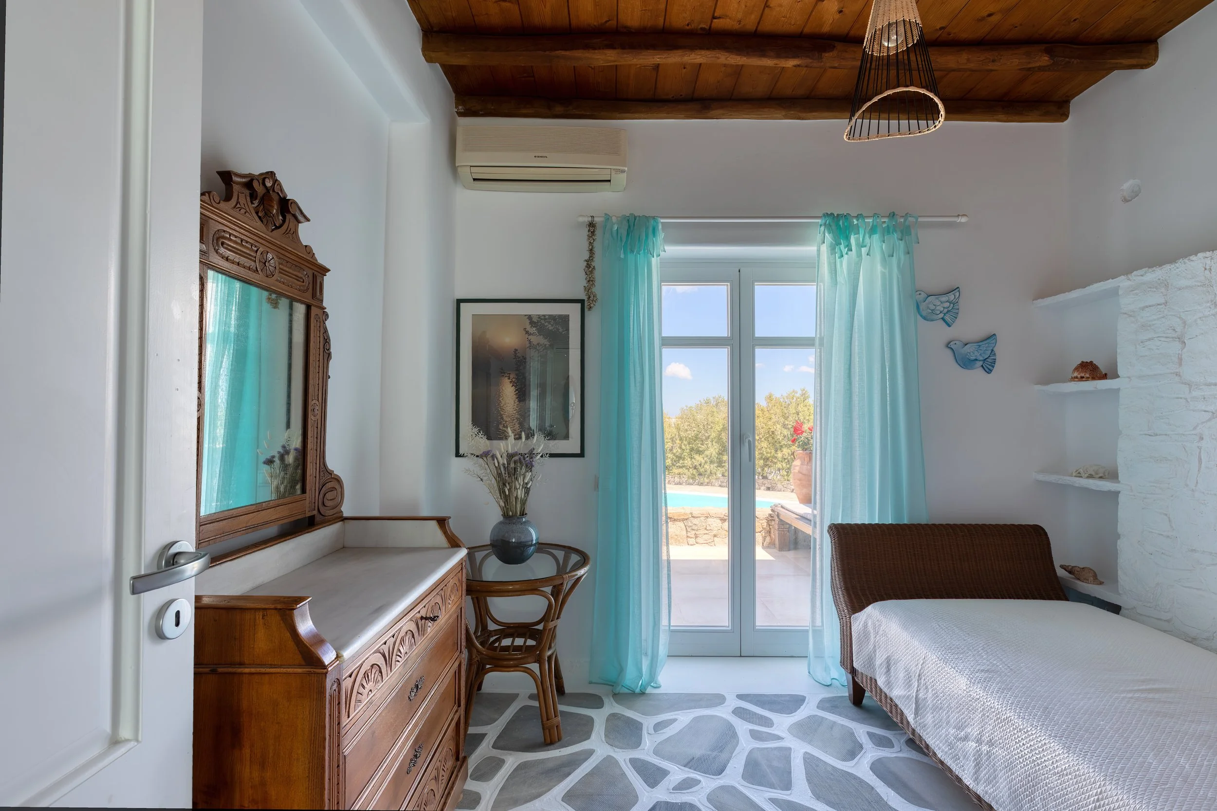 single-bedroom-main-floor-balcony-doors-mykonos.jpg