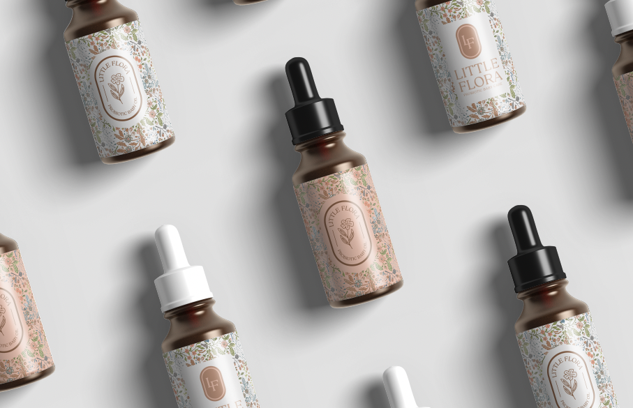   solution three  combining the logo and brand pattern, we designed stickers for the baby oil bottles to be used in product packaging down the road. the detailed, handdrawn florals are eye-catching and beautiful, a bottle that people will want to ref