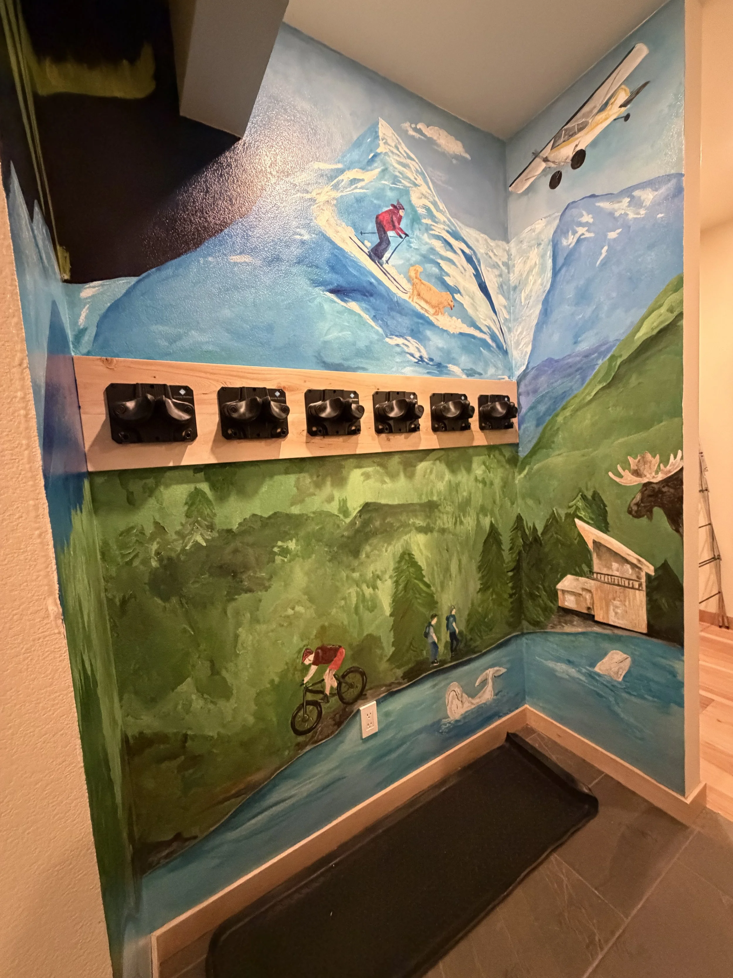 Whimsical mural created for a beautiful Airbnb in Girdwood, blending my landscape style with the client's favorite things about Girdwood.  
