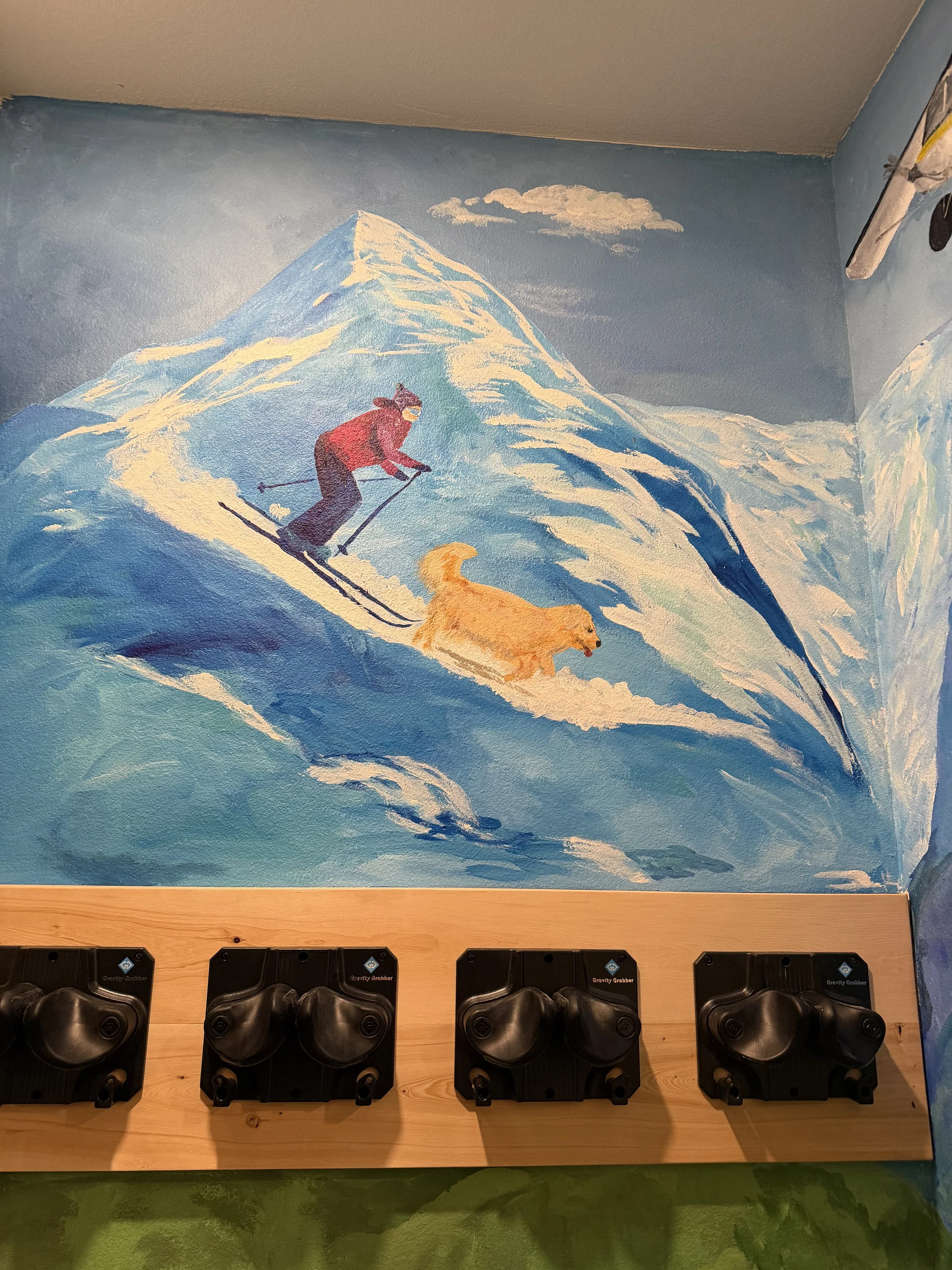 Whimsical mural created for a beautiful Airbnb in Girdwood, blending my landscape style with the client's favorite things about Girdwood.  