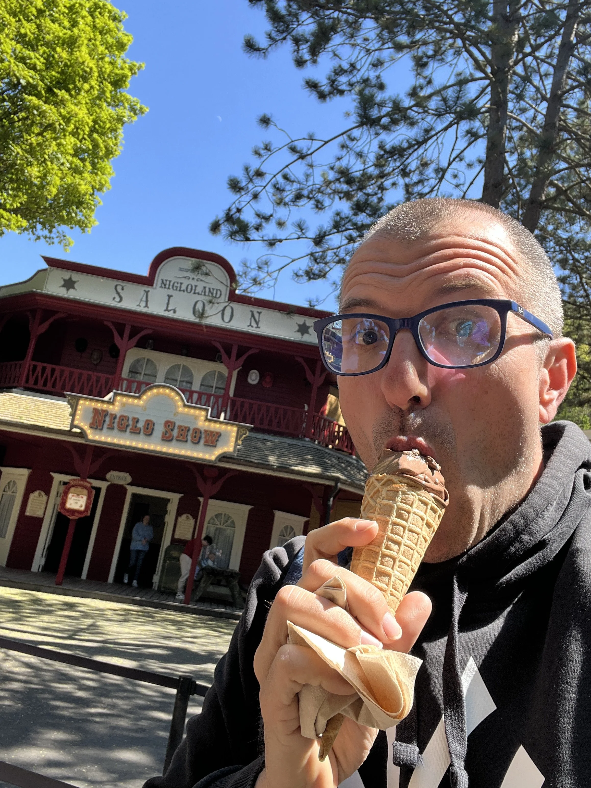 Eating an ice cream in front of the Niglo Show theatre.