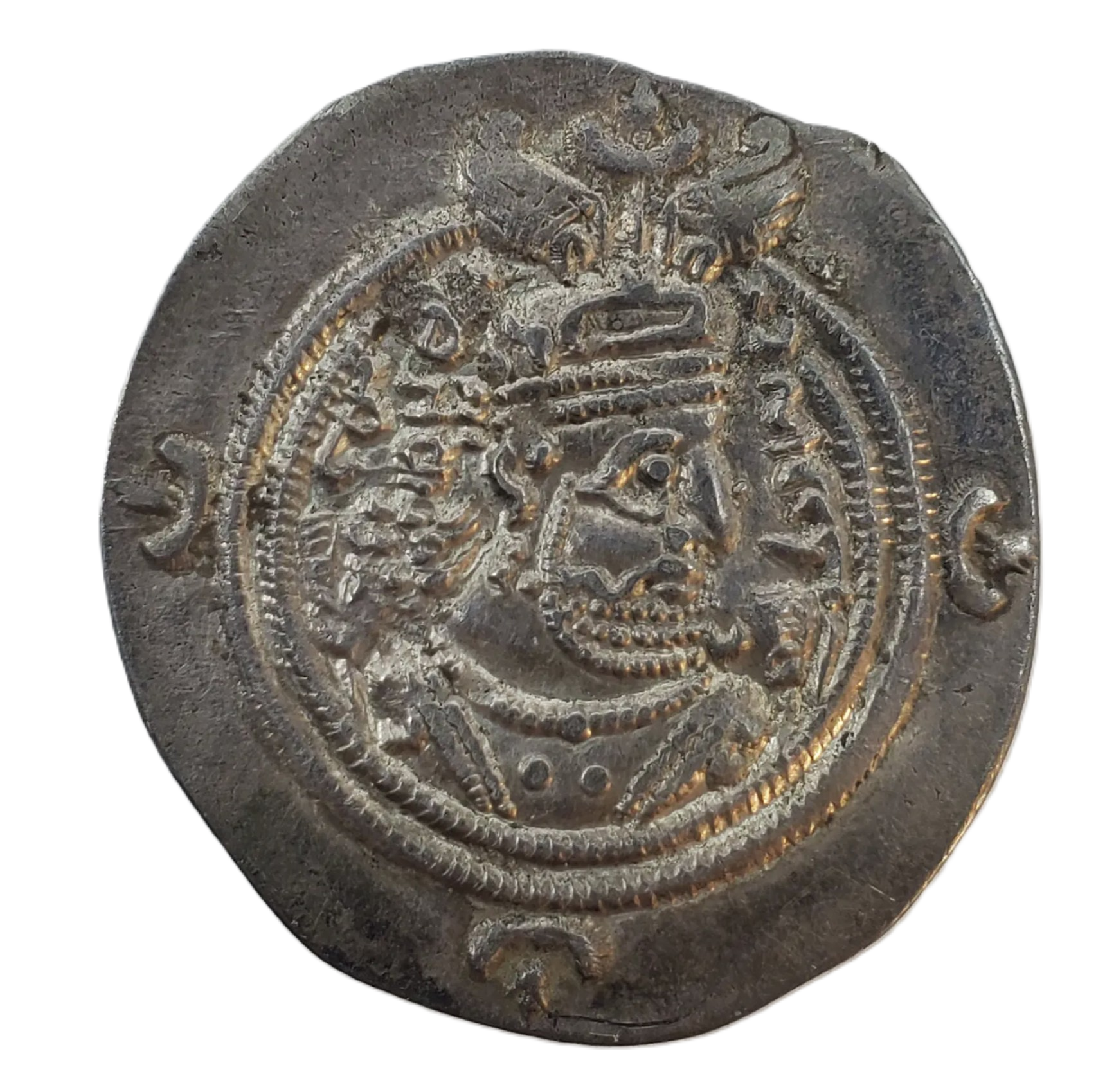 Ancient silver coin with a profile portrait of a ruler in traditional attire, surrounded by decorative borders and inscriptions.