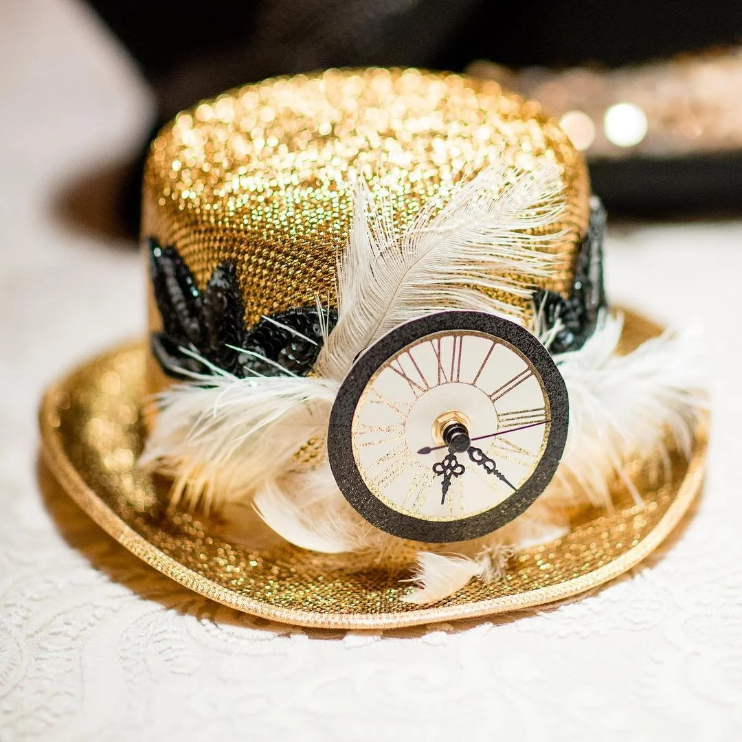 Another photo of the @stylemepretty feature today for the 2016 #NYE #sfwedding ! Custom NYE hats with actual working #countdown clocks! Wowza! Each hat unique. Photographer: @LarissaPhoto | Event Designer: @katesiegelevents | Florals: @kathleendeeryd