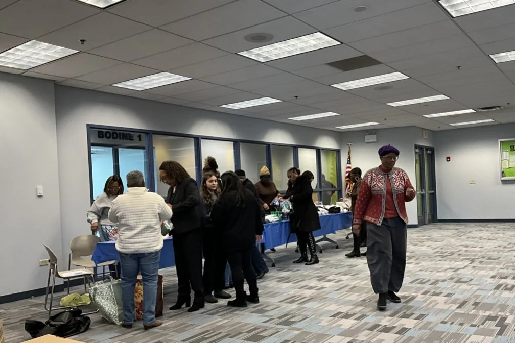 Equippers Church members gather donations for the community.