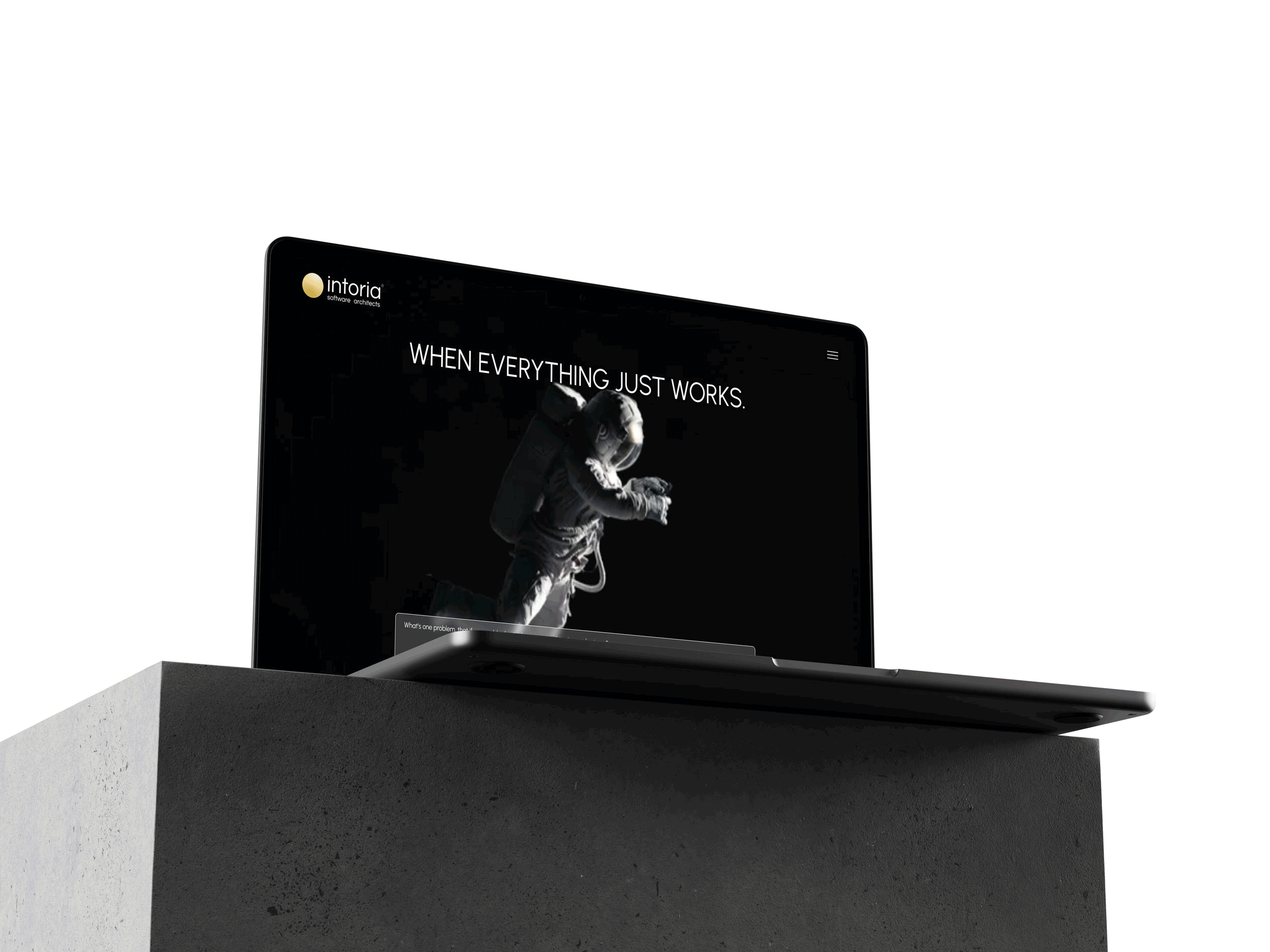 Close-up of a laptop screen showing the Intel logo and a space-themed background with the phrase 'When everything just works'.