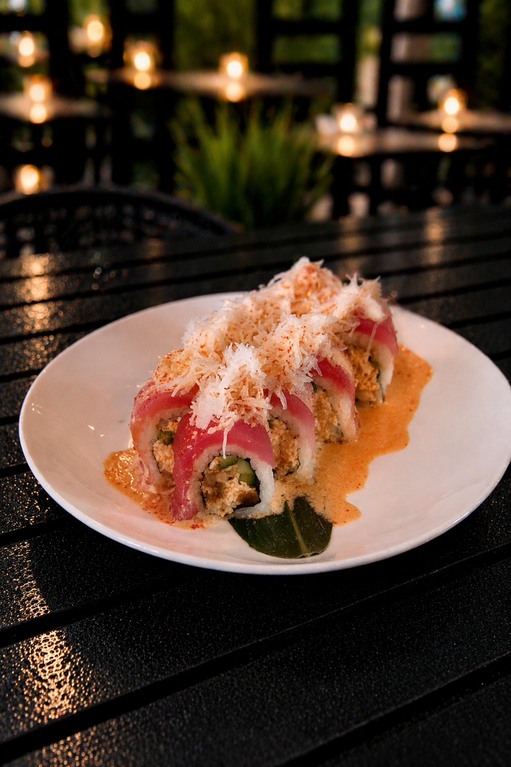 Bonita Roll - $18.95
INSIDE: Soft Shell Crab, Cucumber ......
OUTSIDE: Tuna & Salmon, topped with Radish and Screaming O Sauce