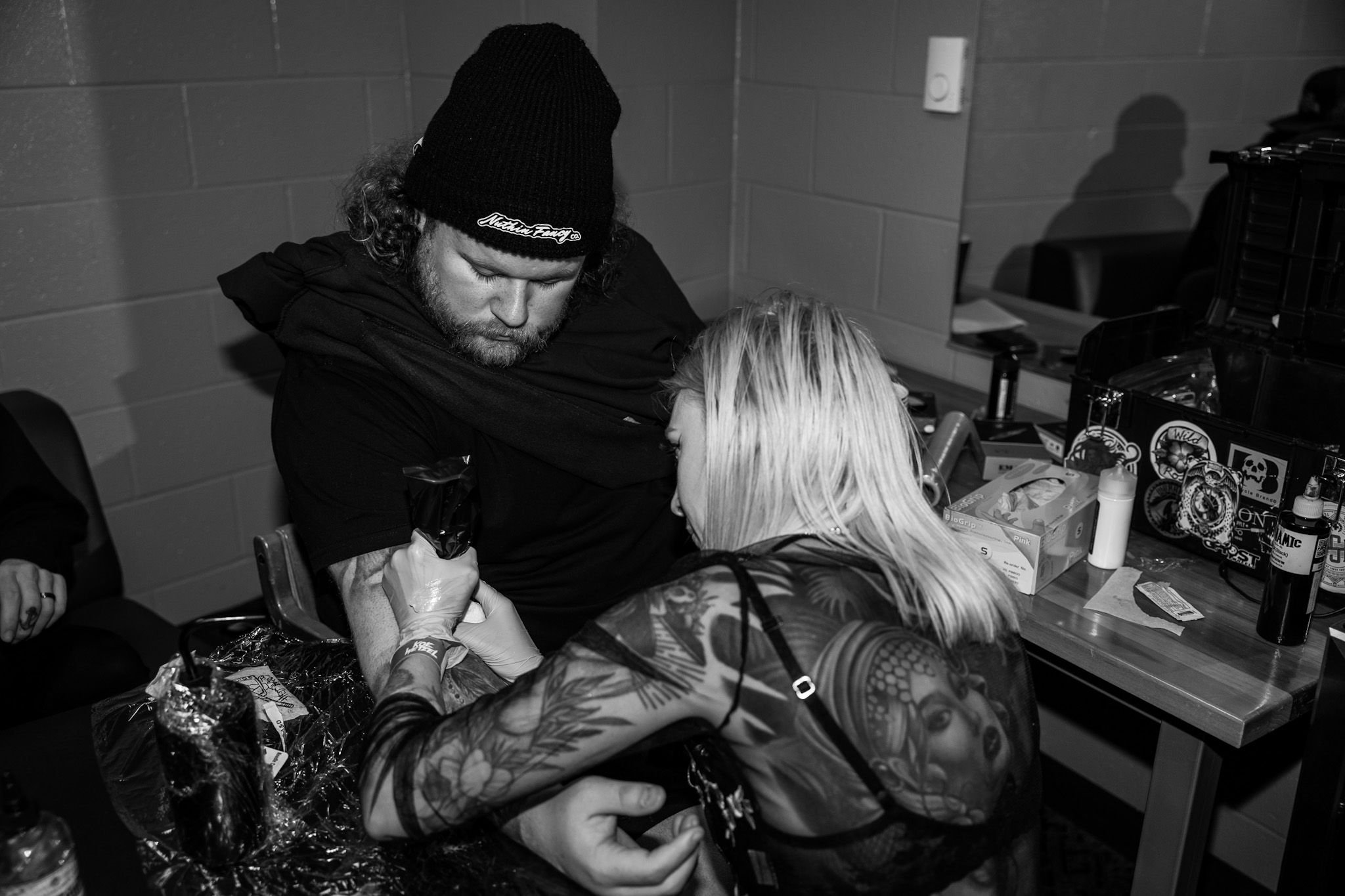 Brittany tattooing country singer, Dylan Wheeler