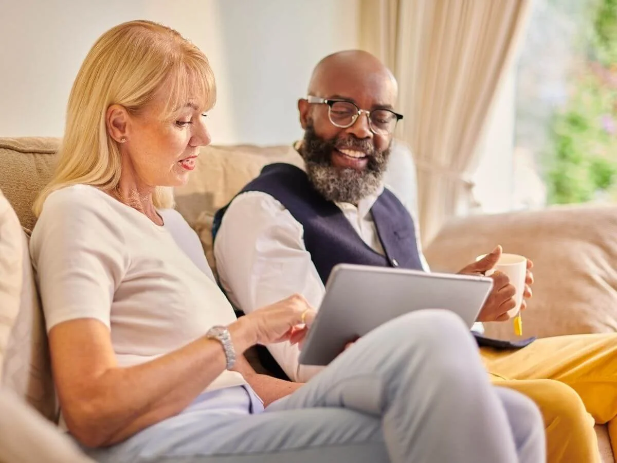 Couple Comparing Burial Insurance Policies
