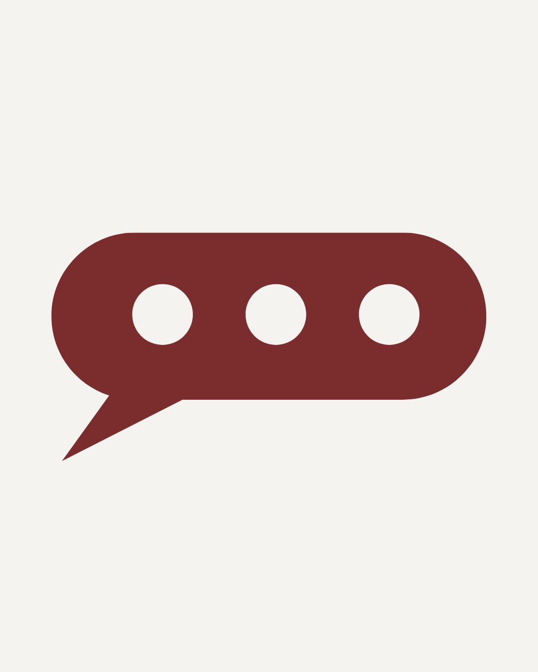 Speech bubble icon with three dots in dark red on a light background.