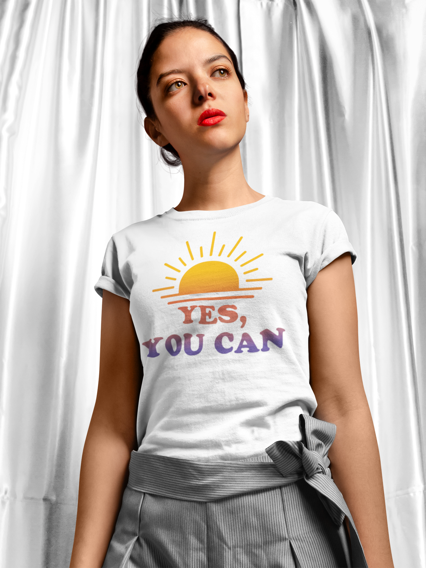 Woman wearing white crop T-shirt with ‘Yes You Can’ sun design, motivational fashion — E.N.K. Feel Good Appare
