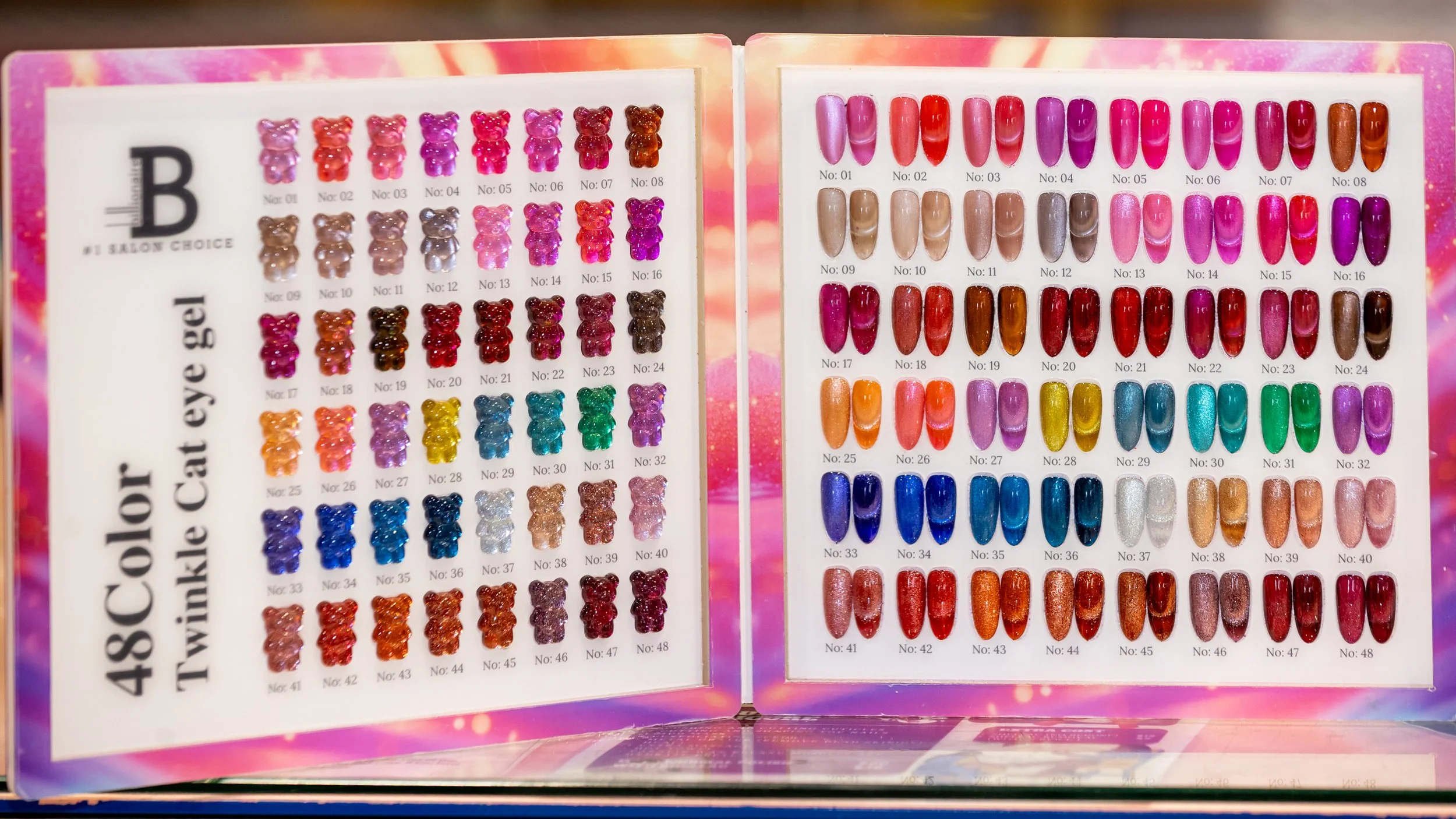 A display chart showing 48 different colors of cat eye gel nail polish arranged in a grid with numbered swatches. The chart is divided into two sections, with the left section containing 24 colors with pinks, browns, and blues, and the right section 