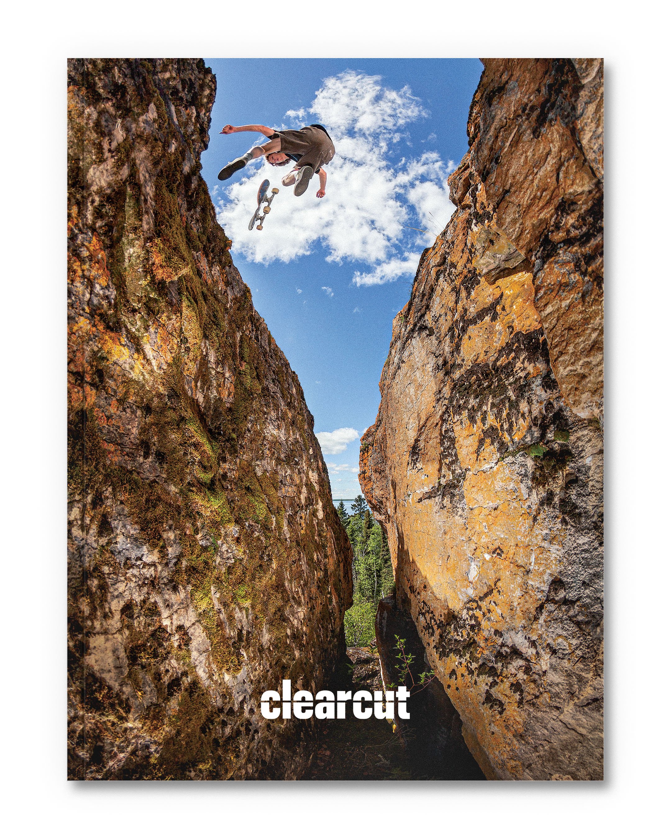 Clearcut Magazine Issue One cover. Erik Penton treflips a rock gap in Northern Manitoba. Photo by Jackson Toone Erik Penton 360 flip a rock gap. Photo by Jackson Toone