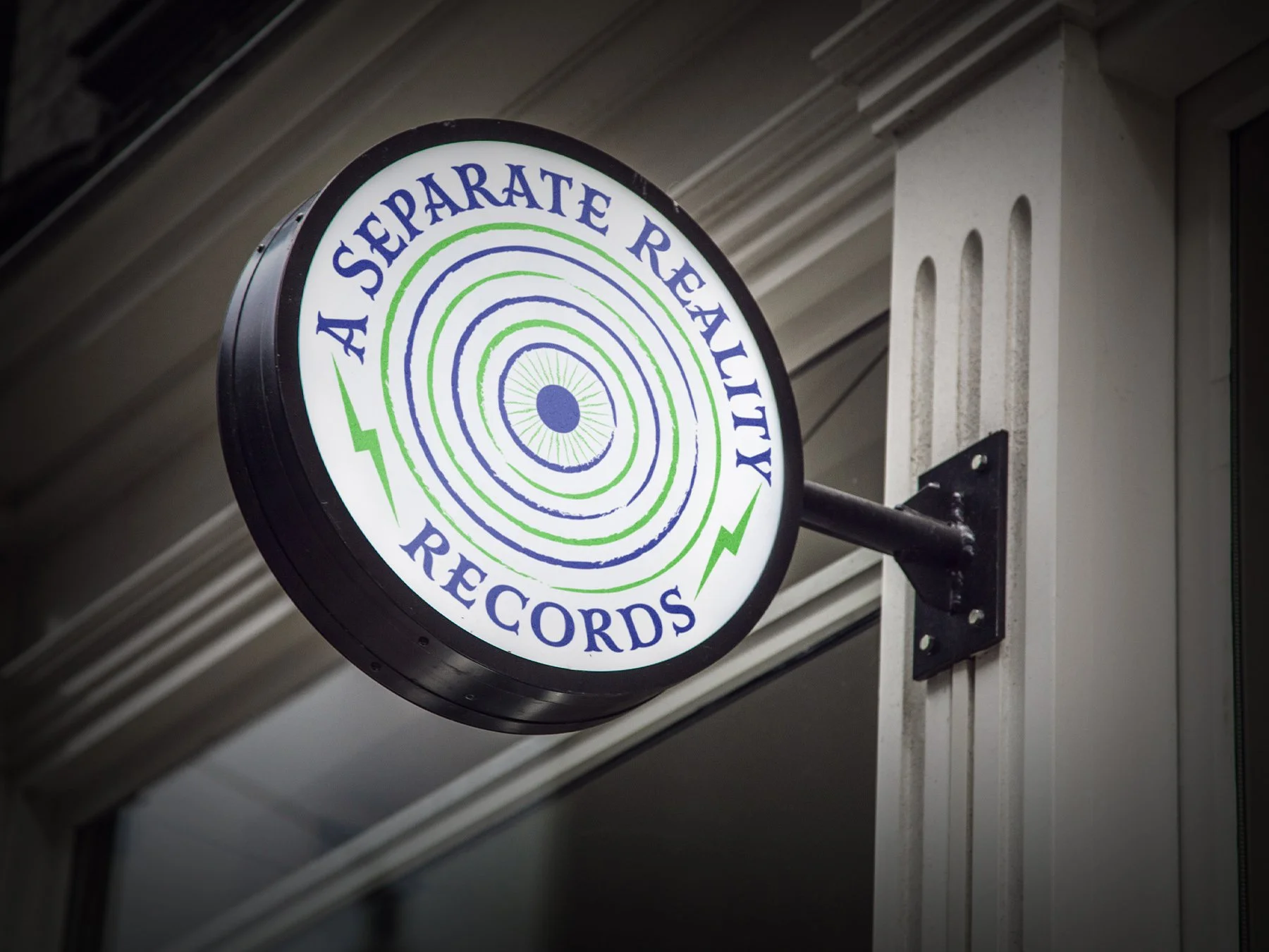separatereality_signage_1800x1350.jpg