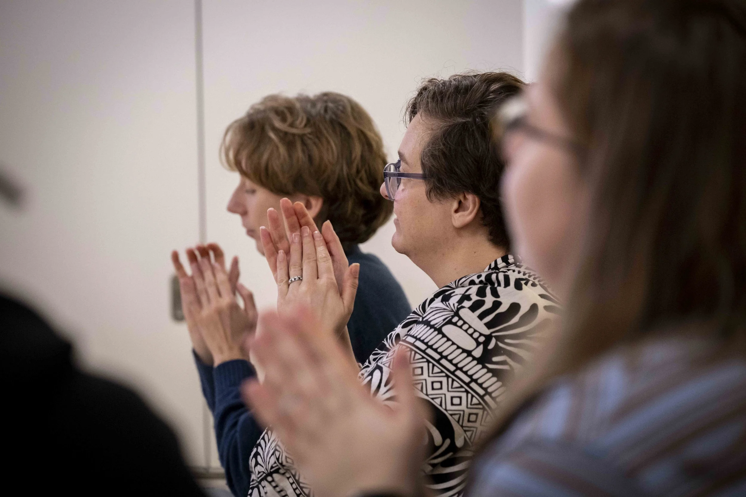 People at The Global Institute of Experience marketing, clapping an expert speaker. Probably Catherine Loveday, Chris Crossley, Rupert Bean, Ben Meyer or Dawn Farrow