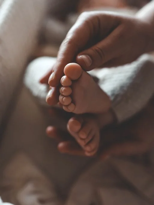 Huddle baby foot, nurtured by IL & NY pediatric team.