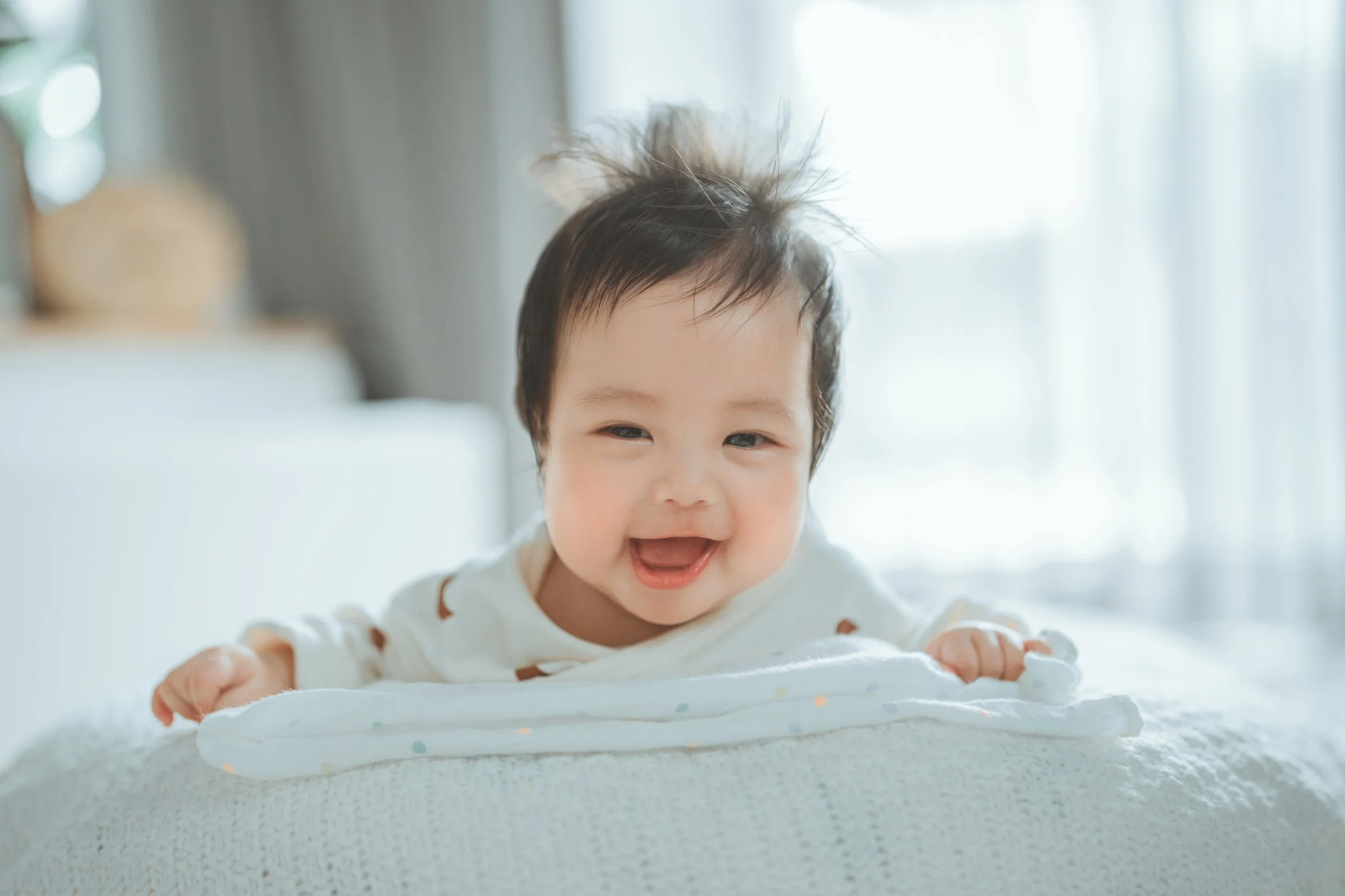 Happy Huddle baby, cared for in IL & NY telehealth.