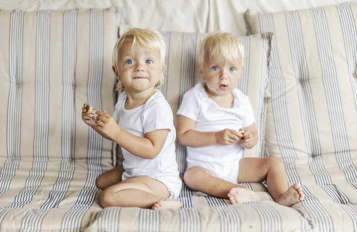 Huddle siblings, cared for by IL & NY telehealth support.