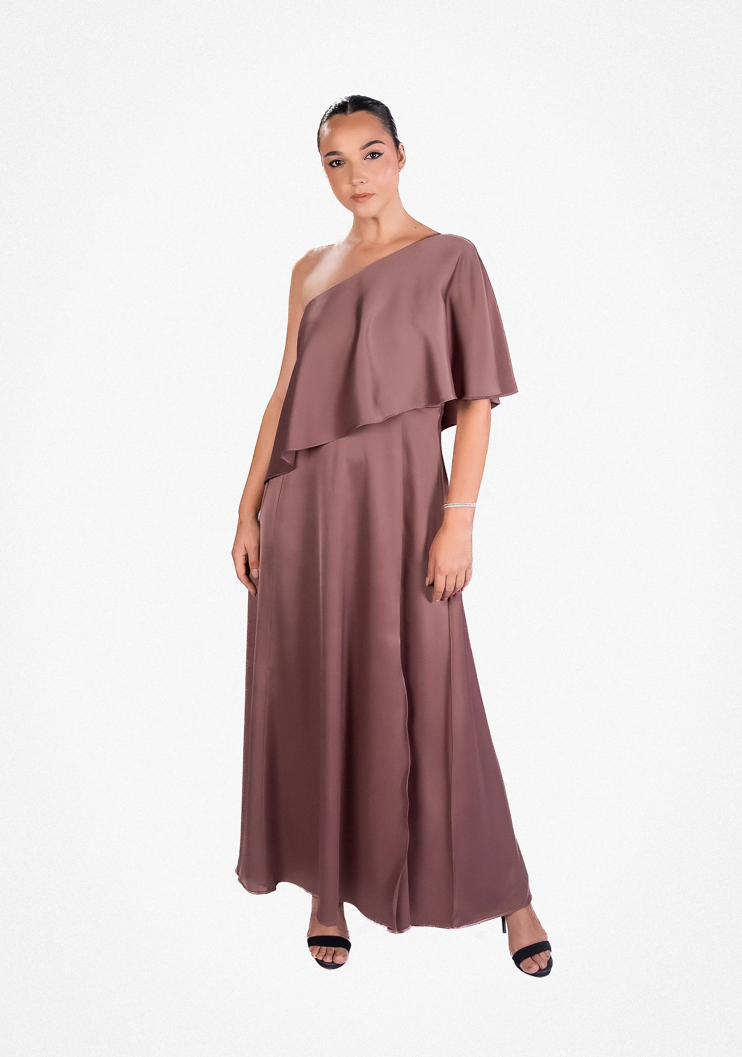 Sleek gown designed with gentle shaping and minimalist detailing (3).jpg