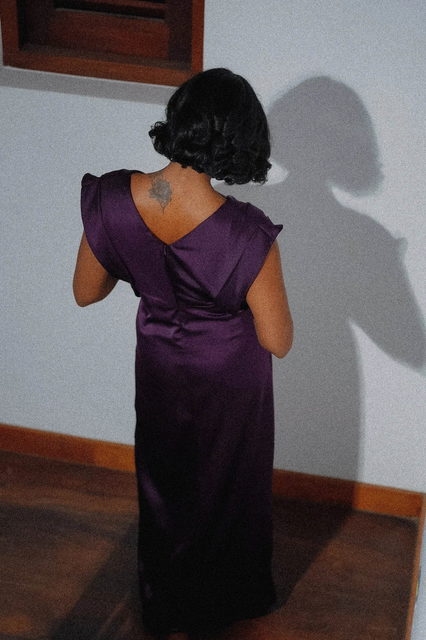 Minimal evening gown with a refined, elegant silhouette.