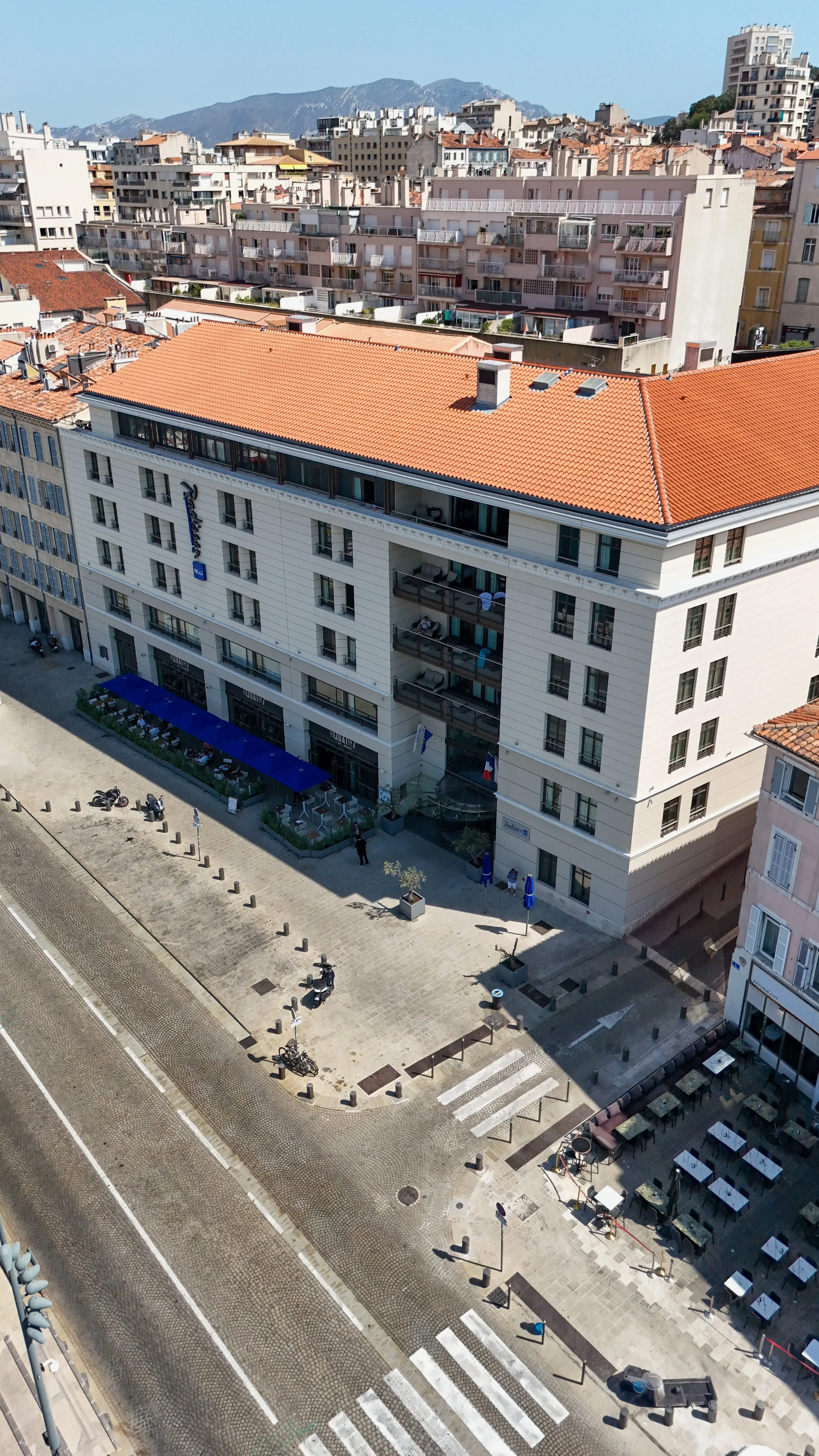 Aerial view overlooking the hotel beside Marseille's historic waterfront