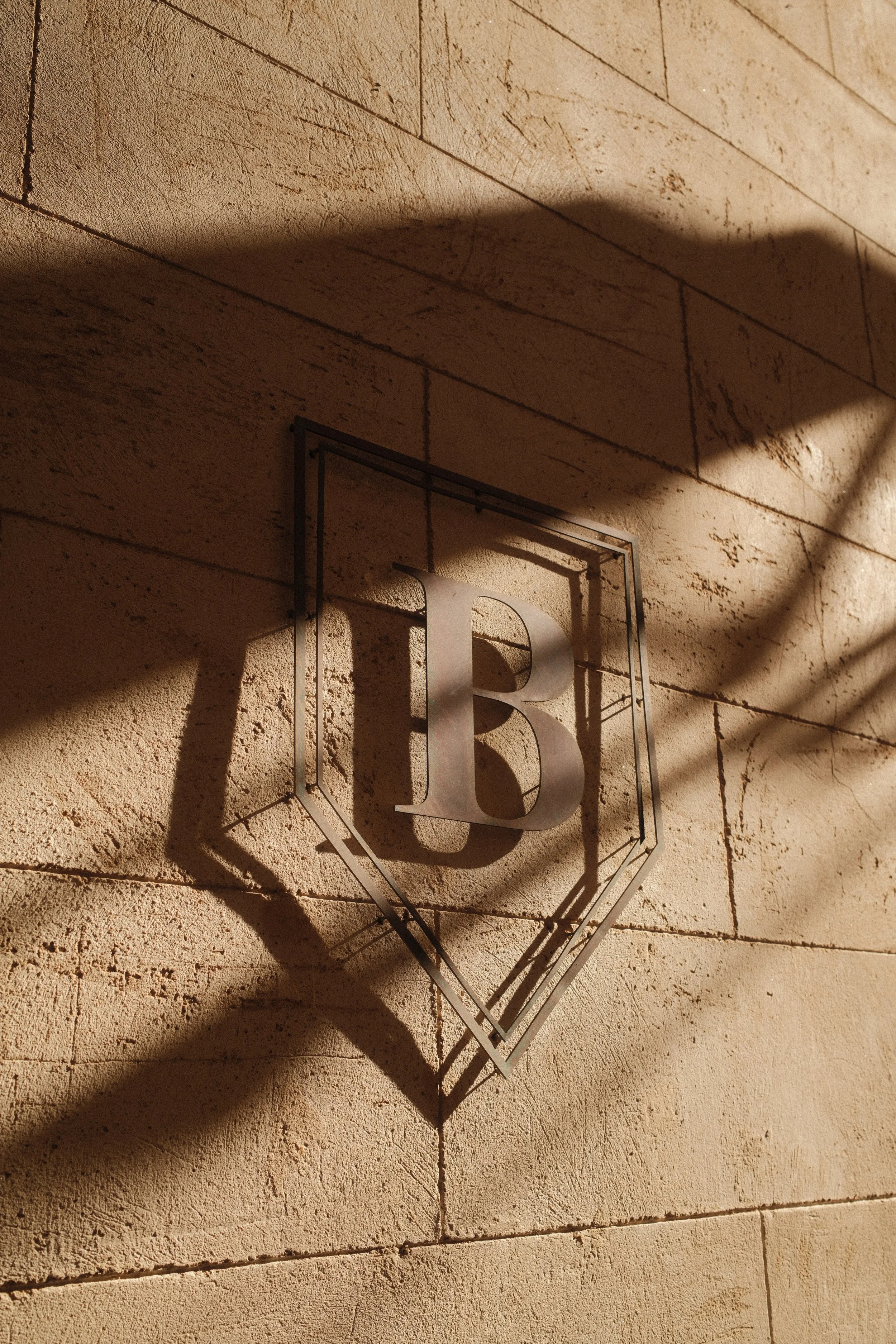 Can Bordoy Grand House & Garden emblem illuminated by warm Mediterranean afternoon light