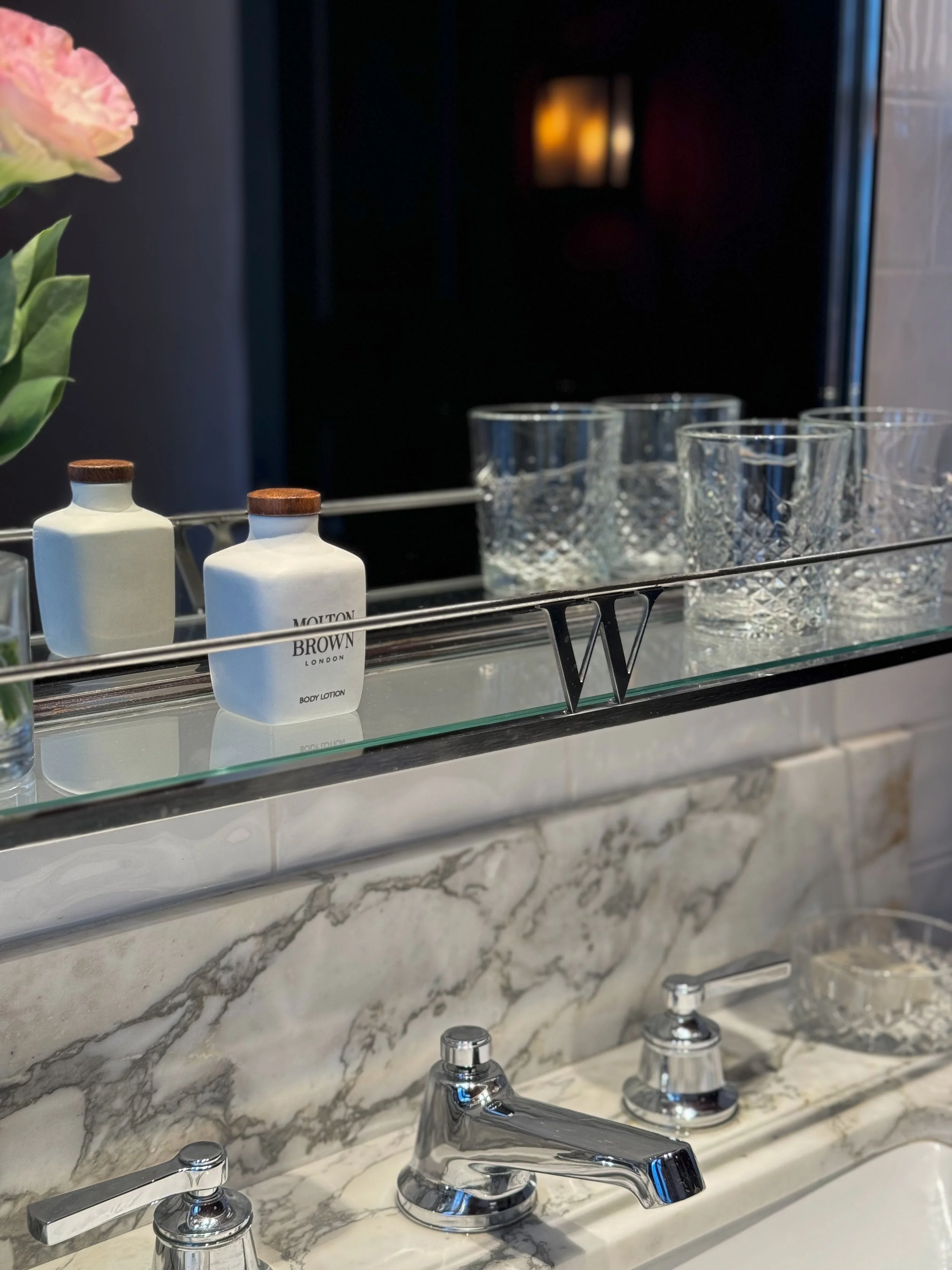 Premium Molton Brown amenities and marble vanity inside a luxury bathroom at Wittmore Hotel