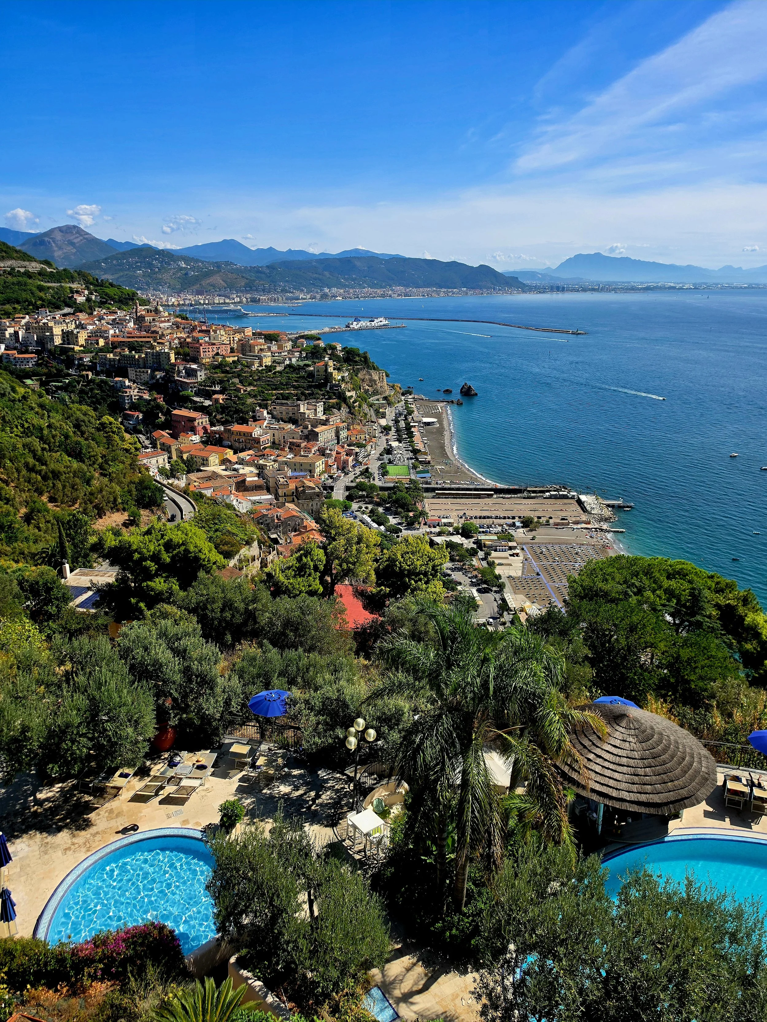Panoramic view over Vietri sul Mare, the coastline, mountains, and outdoor swimming pools