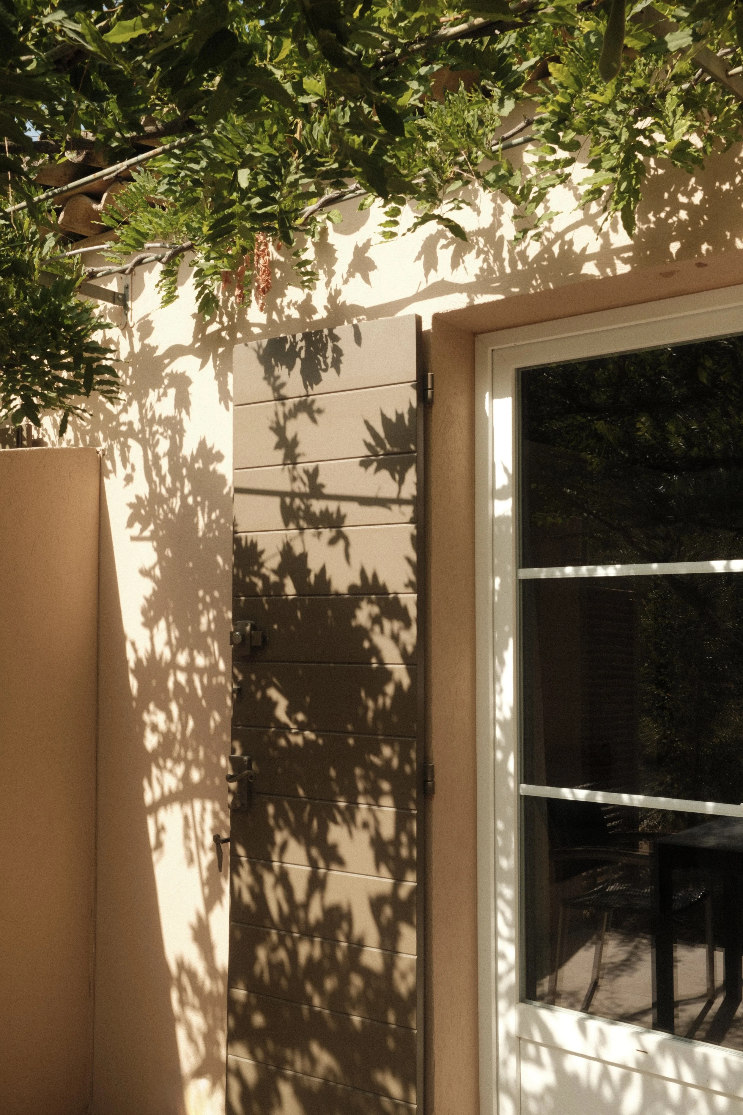 Private terrace surrounded by lush greenery and peaceful garden views