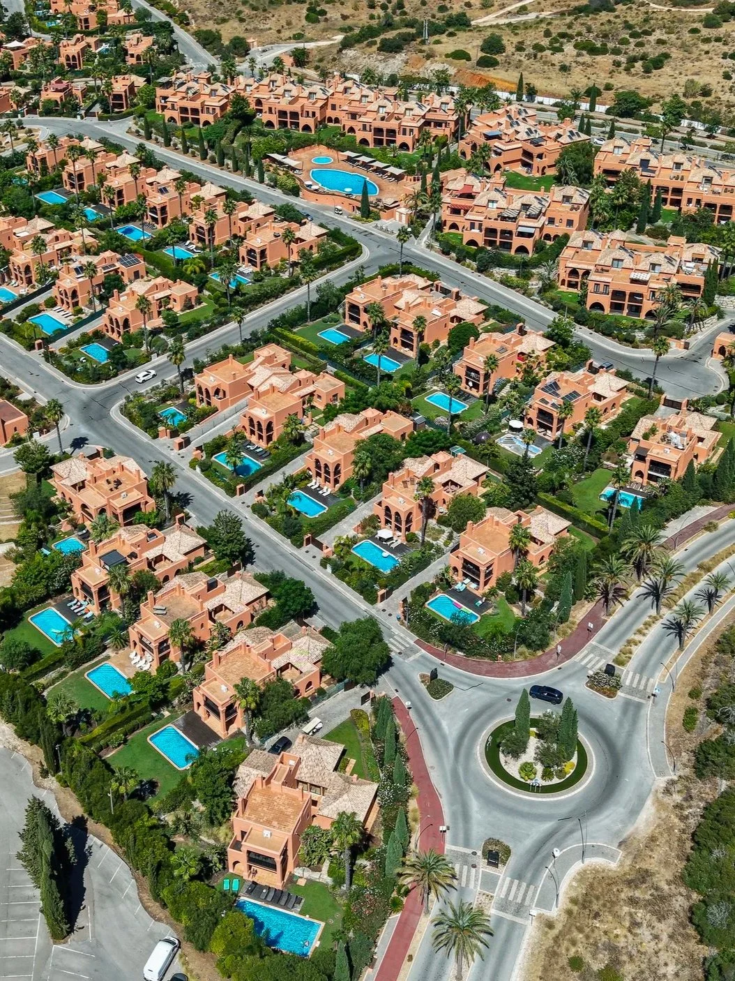 Aerial view of luxury villas with private pools throughout Amendoeira Golf Resort