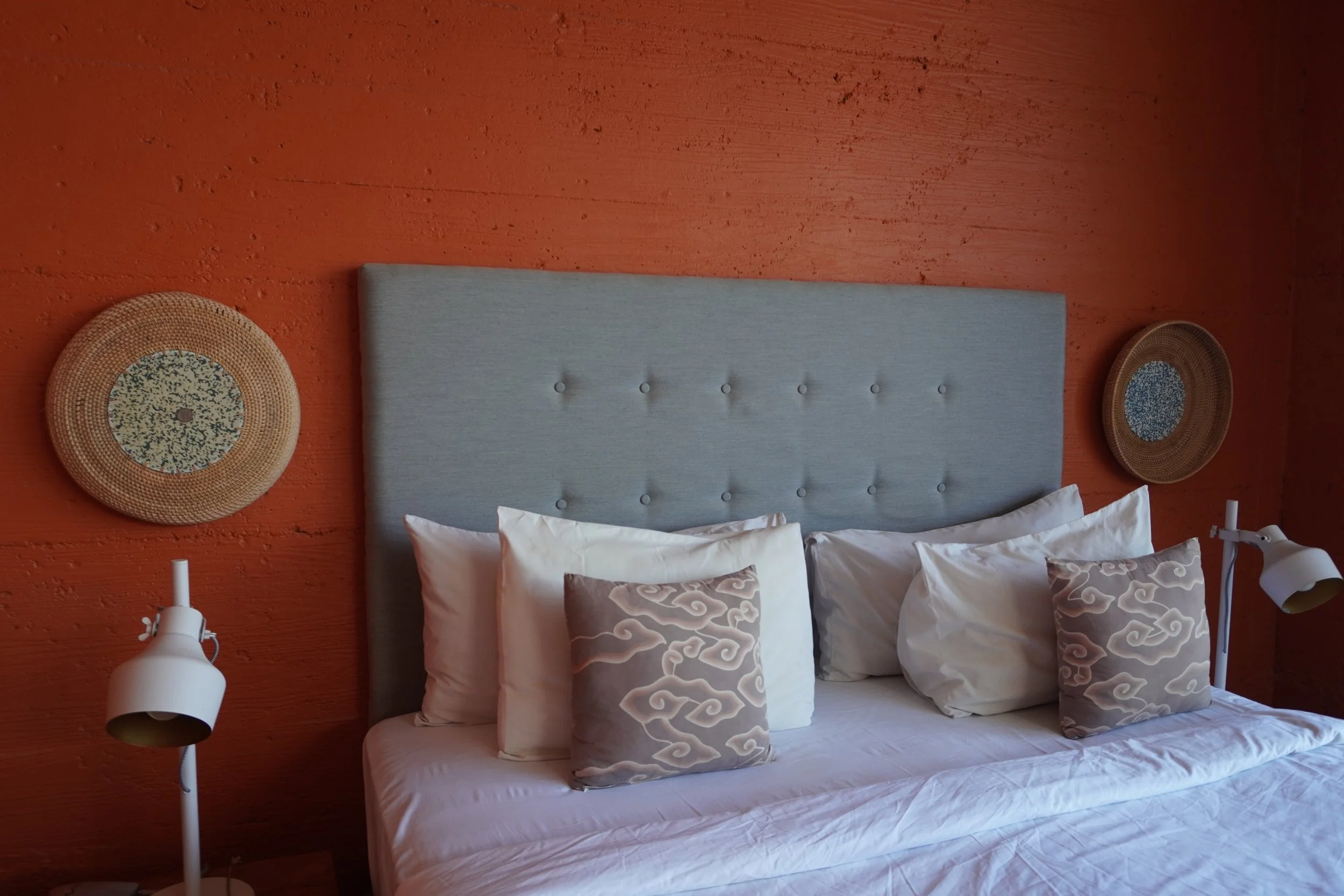Minimalist bedroom with soft tones and handcrafted decorative accents