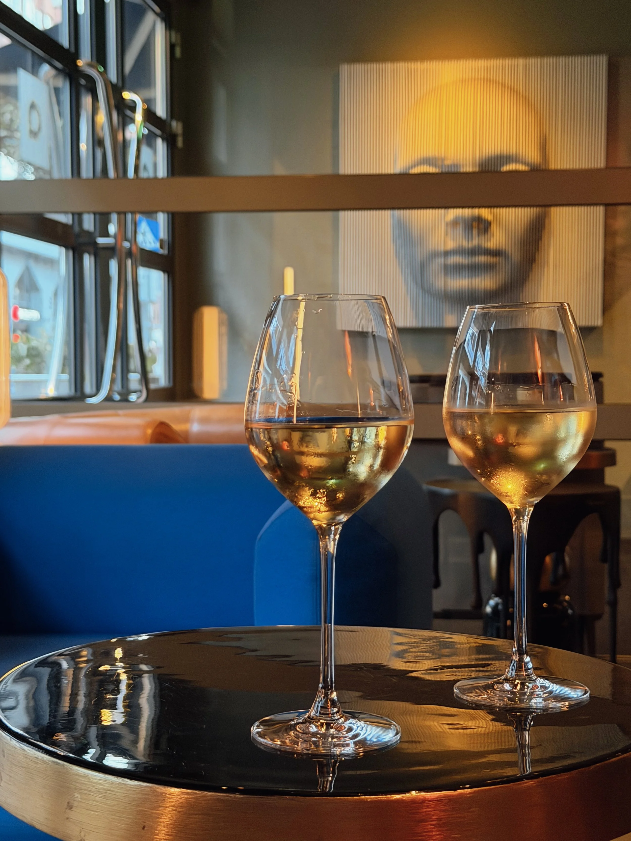 Elegant lounge with white wine and contemporary interior design