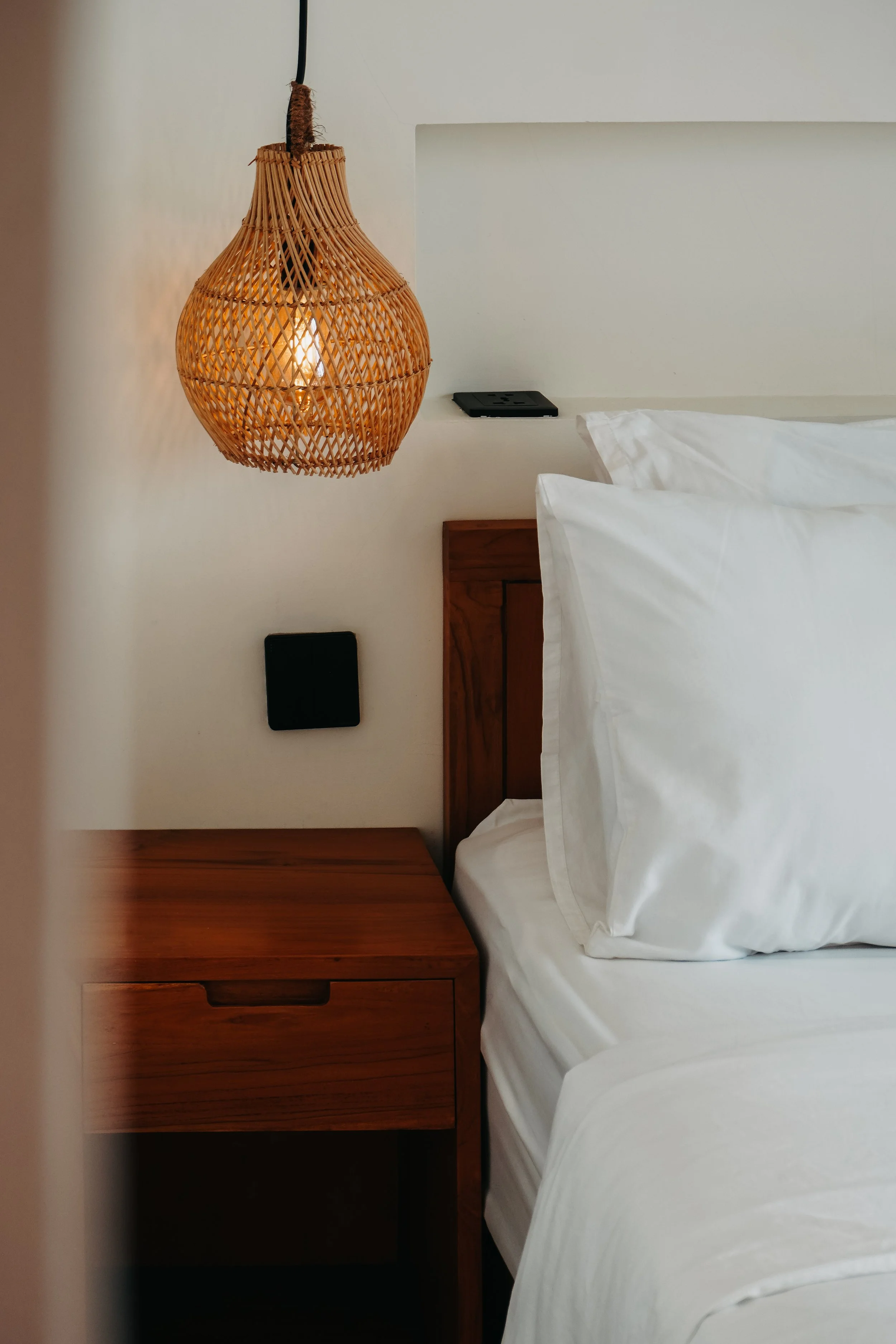 Minimalist interiors softened by natural materials, creating a space that feels both refined and effortless, Uryah Hotel Lombok – Lombok, Indonesia.