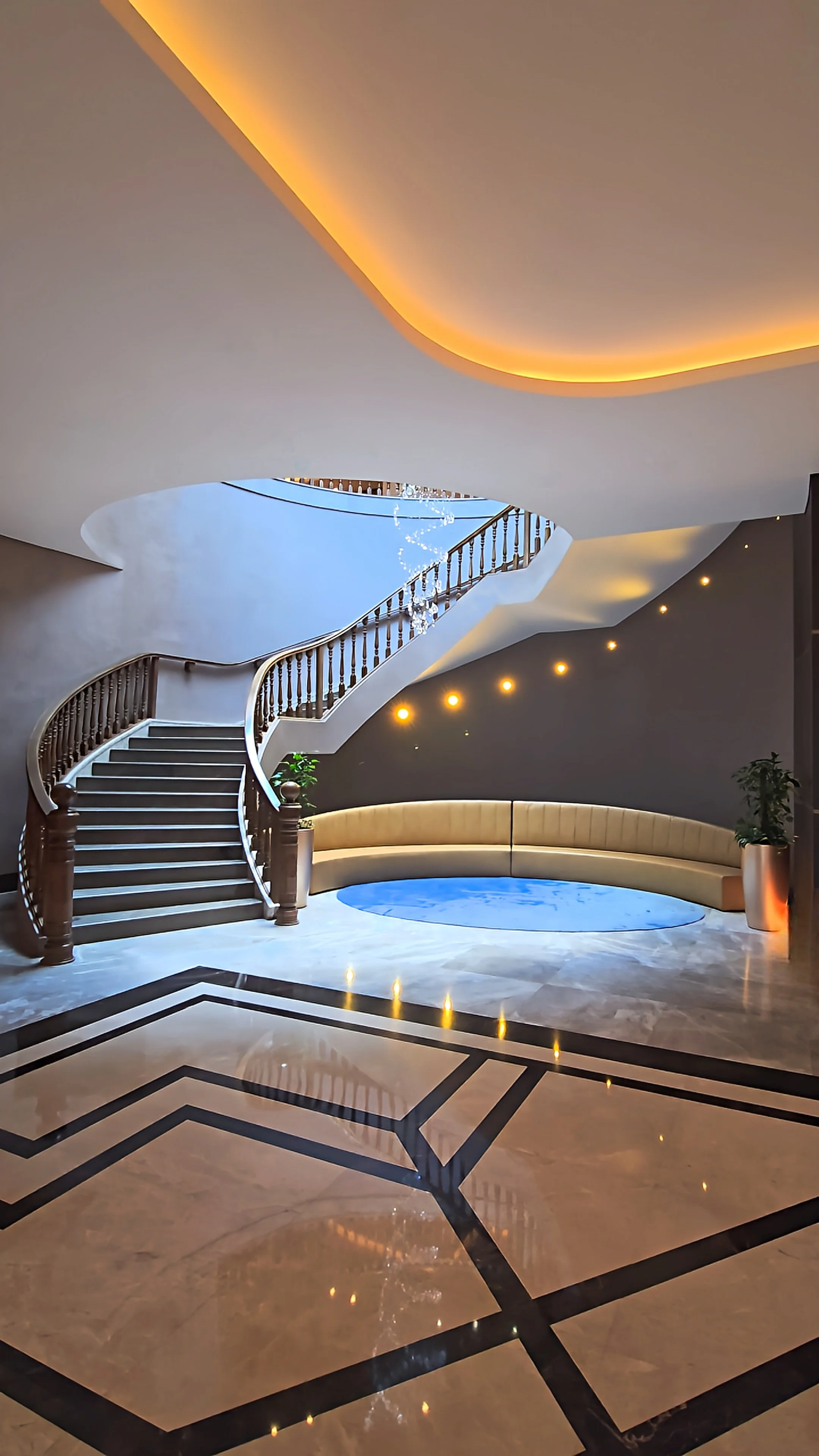 Grand lobby showcasing sweeping staircases, marble finishes and contemporary architectural design at Silk Road by Minyoun Hotel