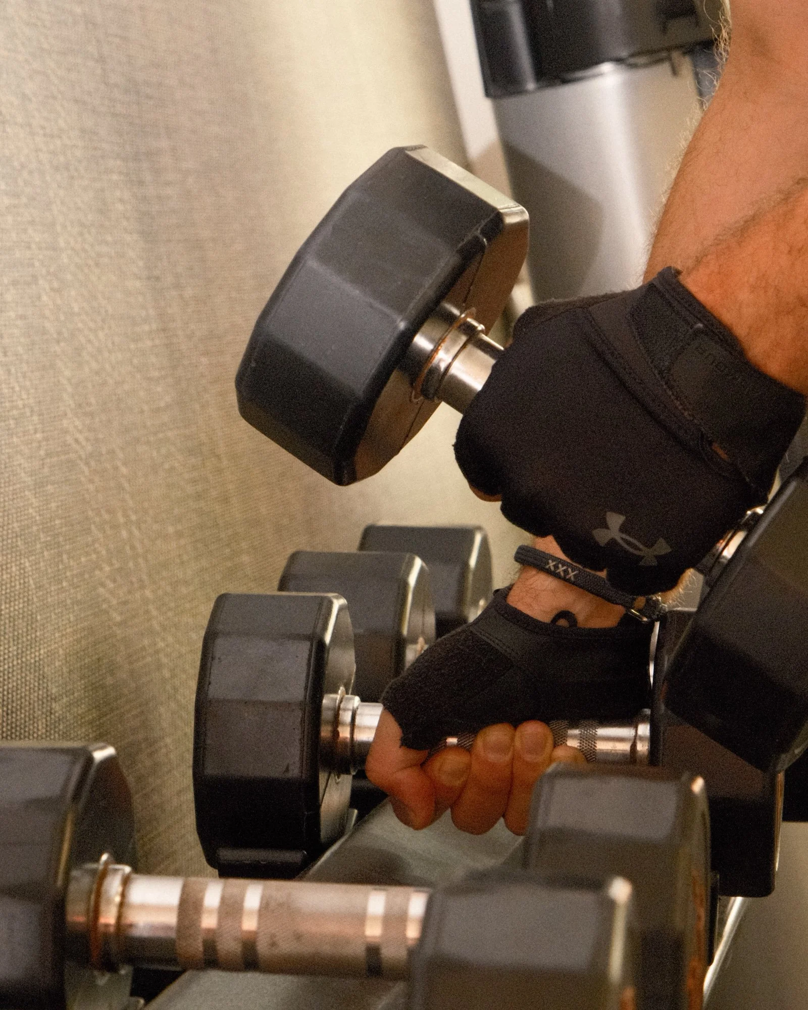 Modern fitness area with free weights for guest workouts