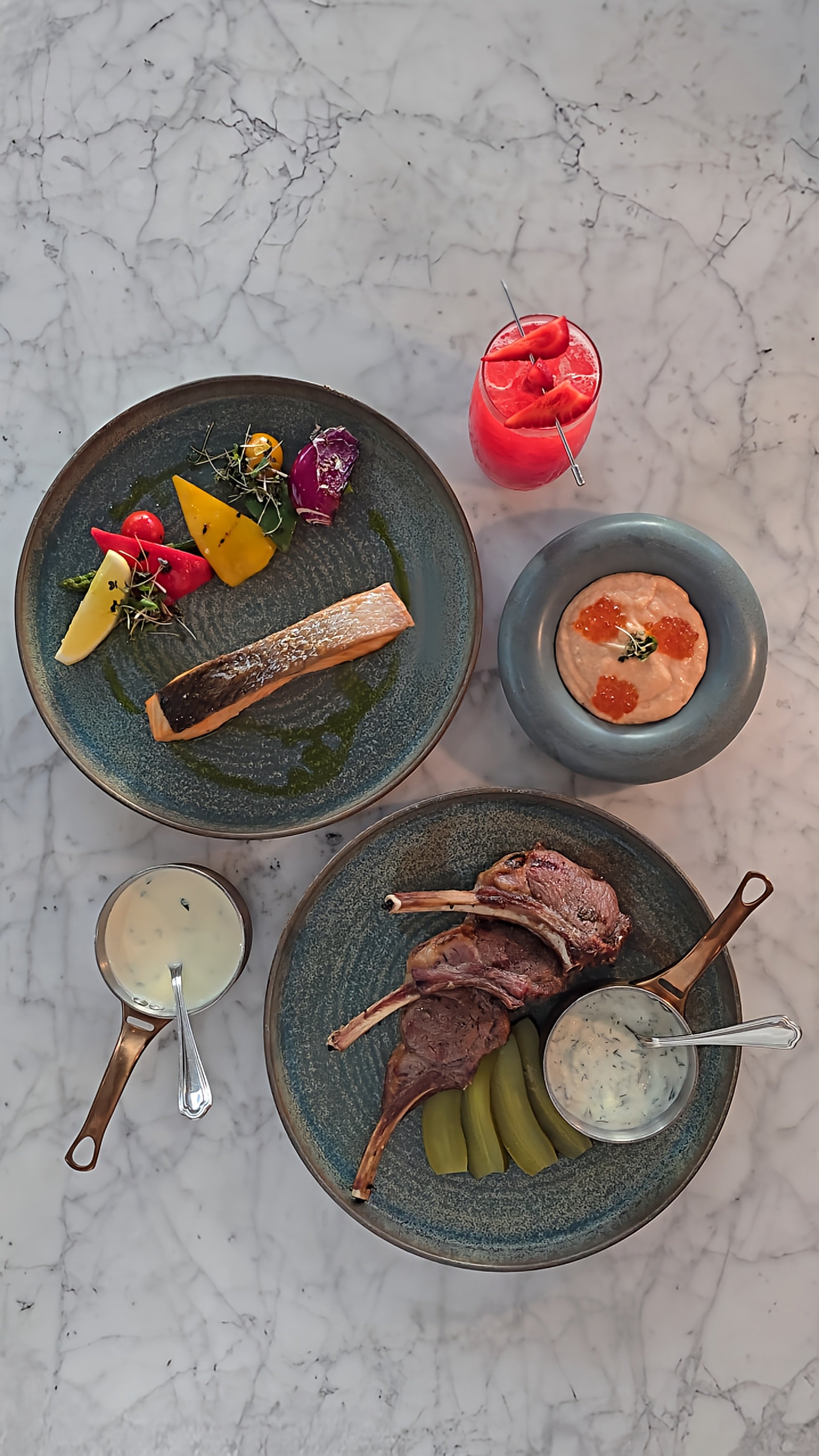 Signature seafood and grilled meat dishes served with handcrafted cocktails at the restaurant of JW Marriott Hotel Tashkent