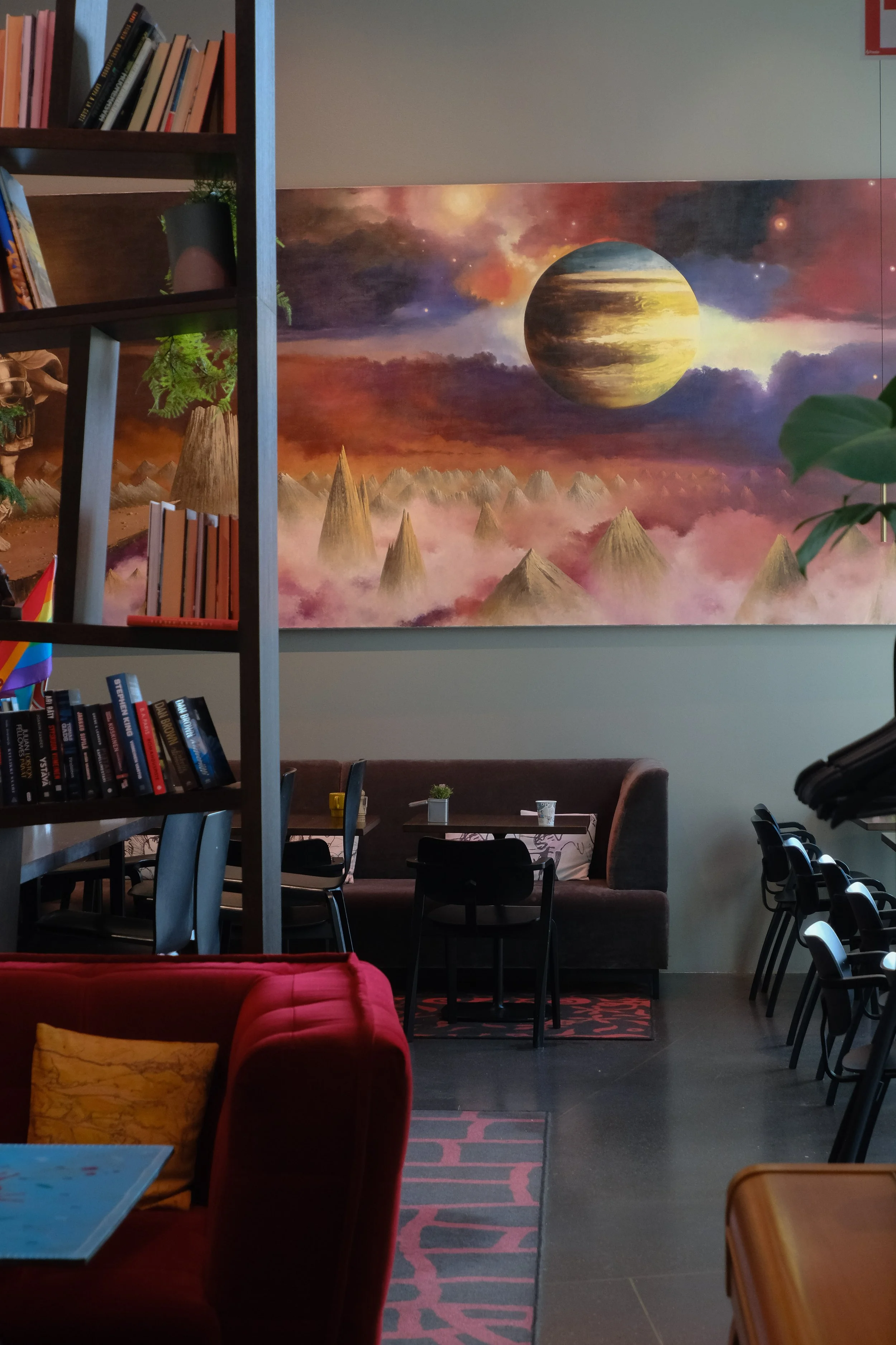 Stylish lounge area featuring contemporary artwork and comfortable seating