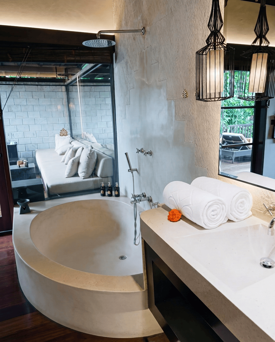 Elegant bathroom with soaking tub and outdoor shower design at Hanging Gardens of Bali