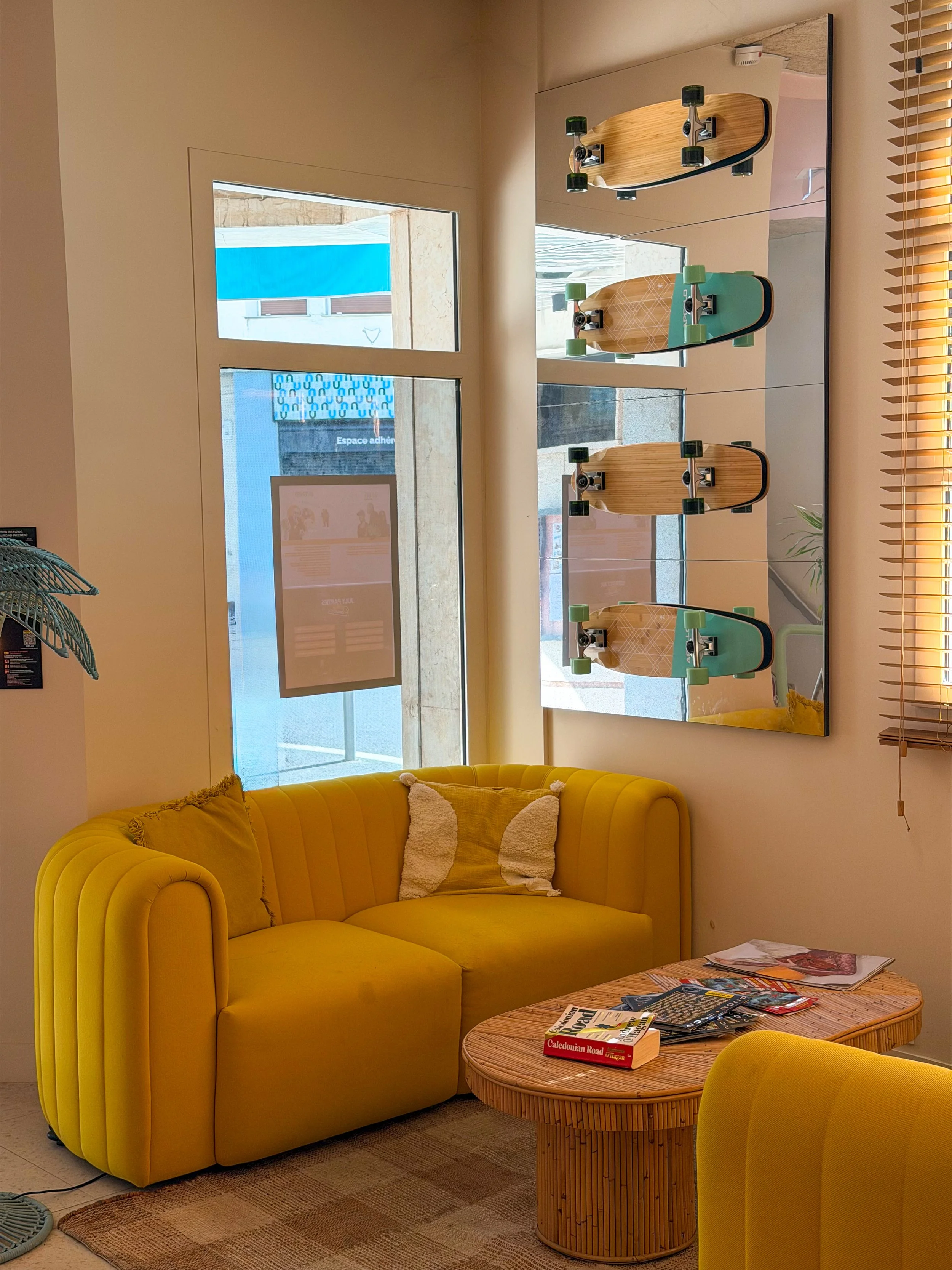 Bright lounge area featuring colourful furnishings and surf inspired décor