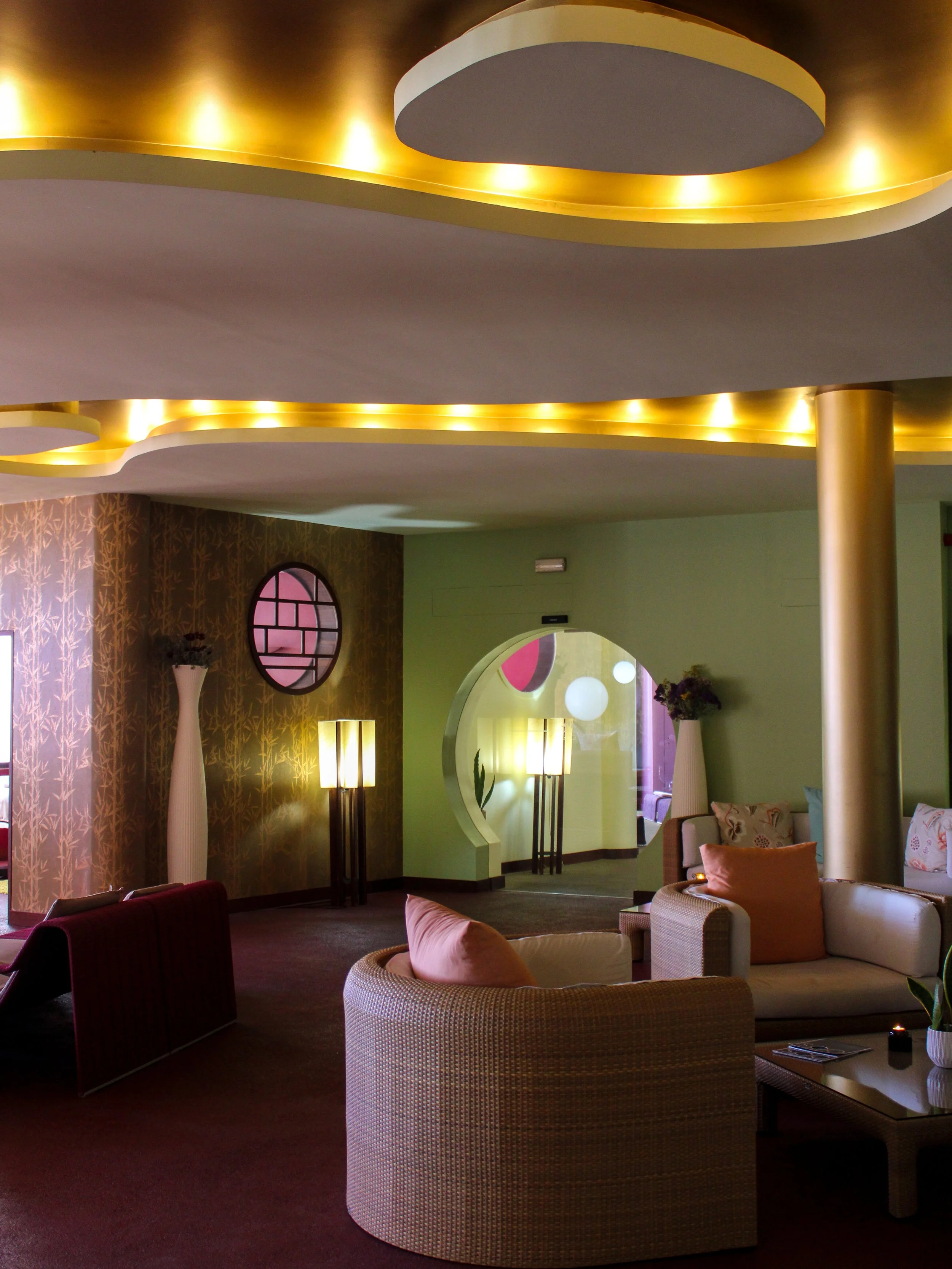 Elegant hotel lounge with contemporary interiors, soft lighting, and comfortable seating areas